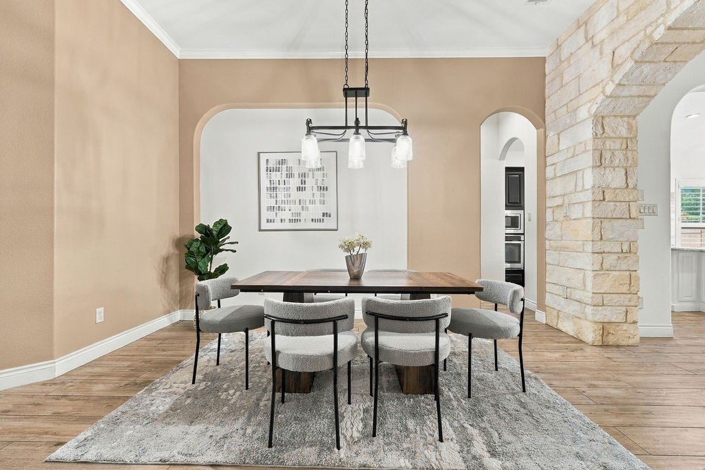 2936 Hawkins Creek Lane, League City, TX 77573 Cozy dining nook framed by a beautiful stone archway.