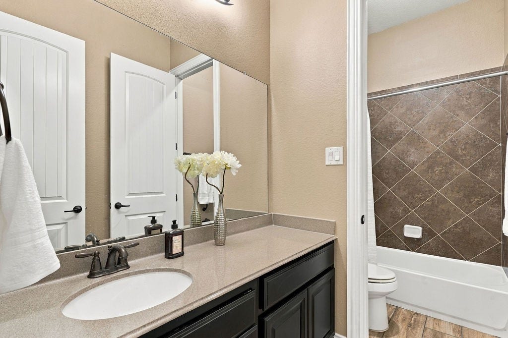 2936 Hawkins Creek Lane, League City, TX 77573 Bright finishes and clean lines in the primary bath.