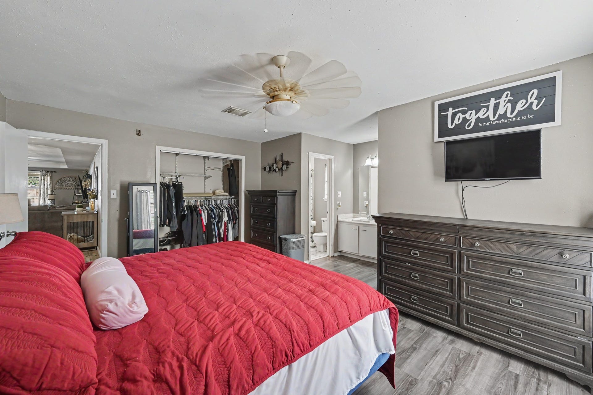 1115 Thomas Drive, Humble, TX 77338 Primary suite featuring a spacious layout with ample room for furniture and decor.