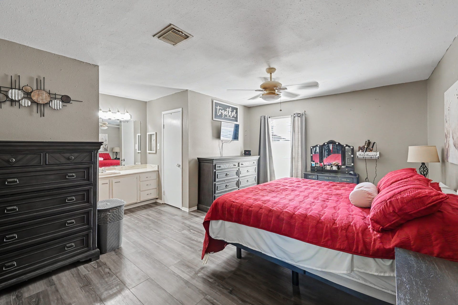1115 Thomas Drive, Humble, TX 77338 Primary suite featuring a spacious layout with ample room for furniture and decor.