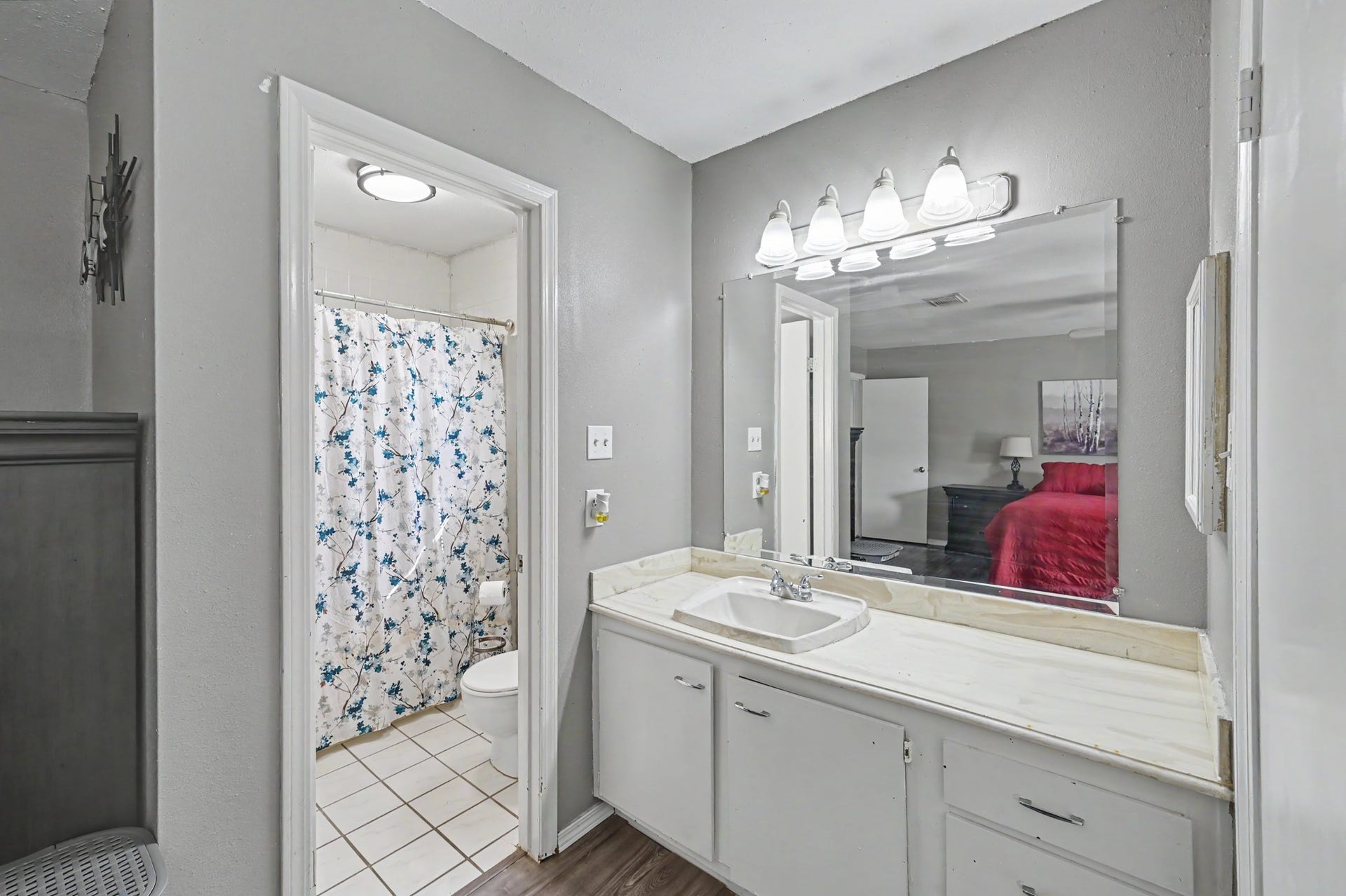 1115 Thomas Drive, Humble, TX 77338 Primary bathroom with updated fixtures and spacious vanity.