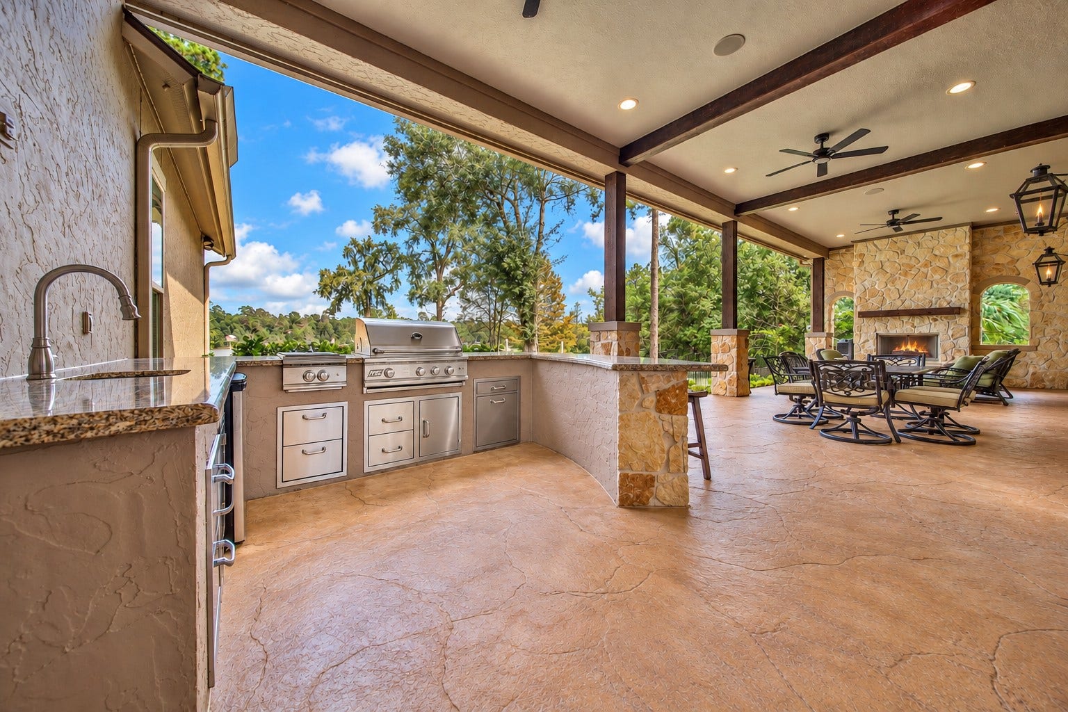 Lunch need not interrupt an afternoon outdoors. The covered outdoor kitchen keeps the grill, crawfish boil burner, sink and serving counter close to the conversation, with the lake and your beautiful pool and spa providing the backdrop.