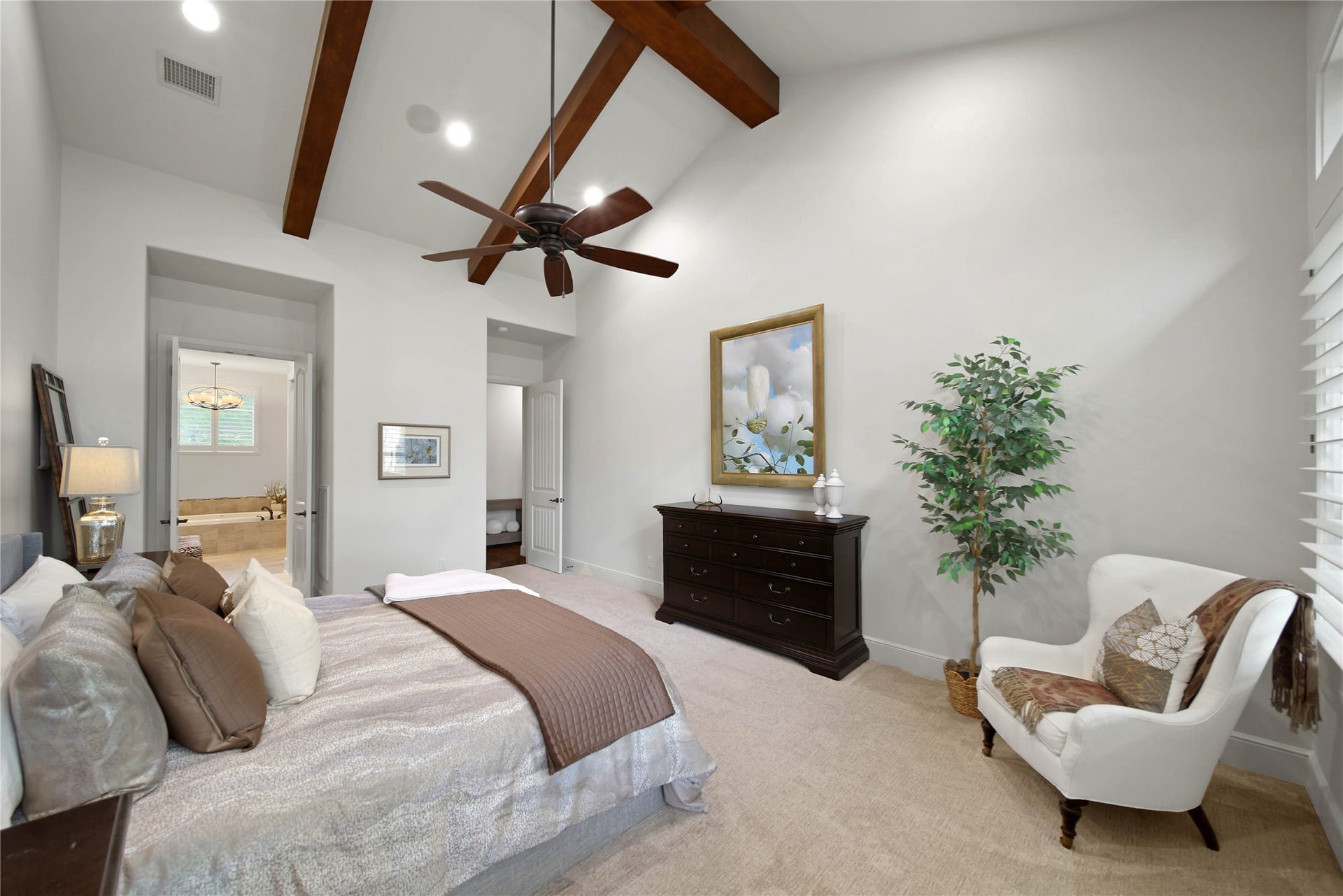 A spacious room to sleep and relax. Imagine a good book that when you look up you see the lake, wooded backyard, and your pool and spa.