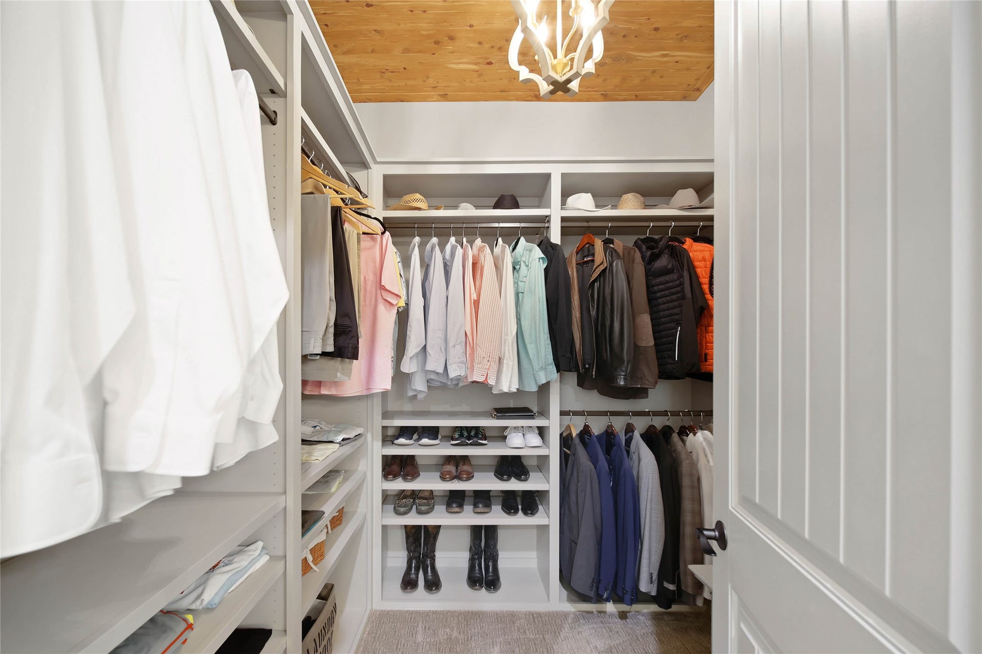 The primary suite features two upscale walk-in closets.