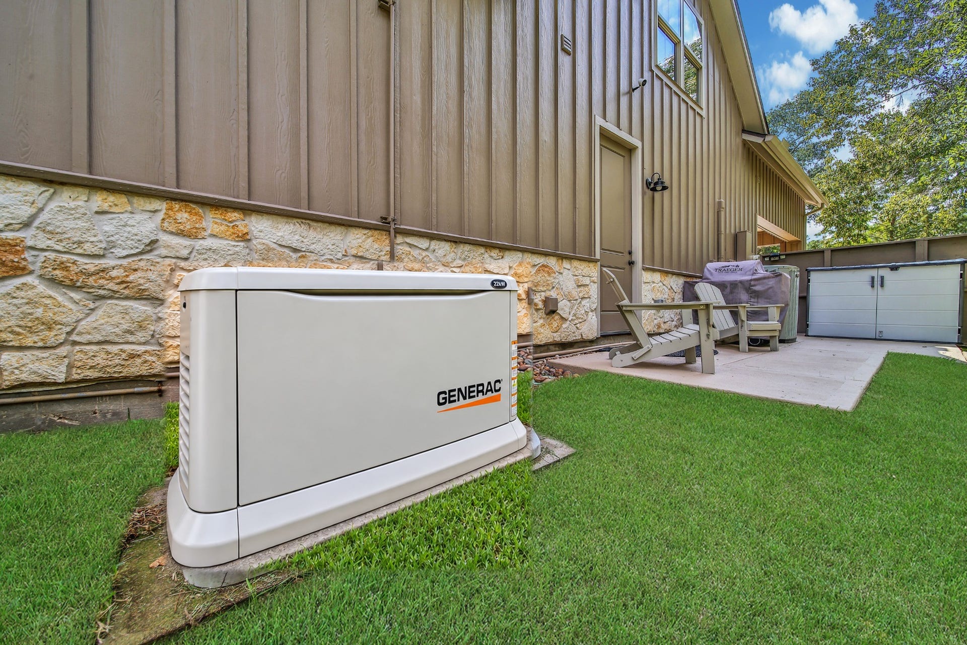 Behind the scenes, a generator adds a practical feature to this lakeside home. Thoughtful living includes the details that support the moments enjoyed out front and out back.