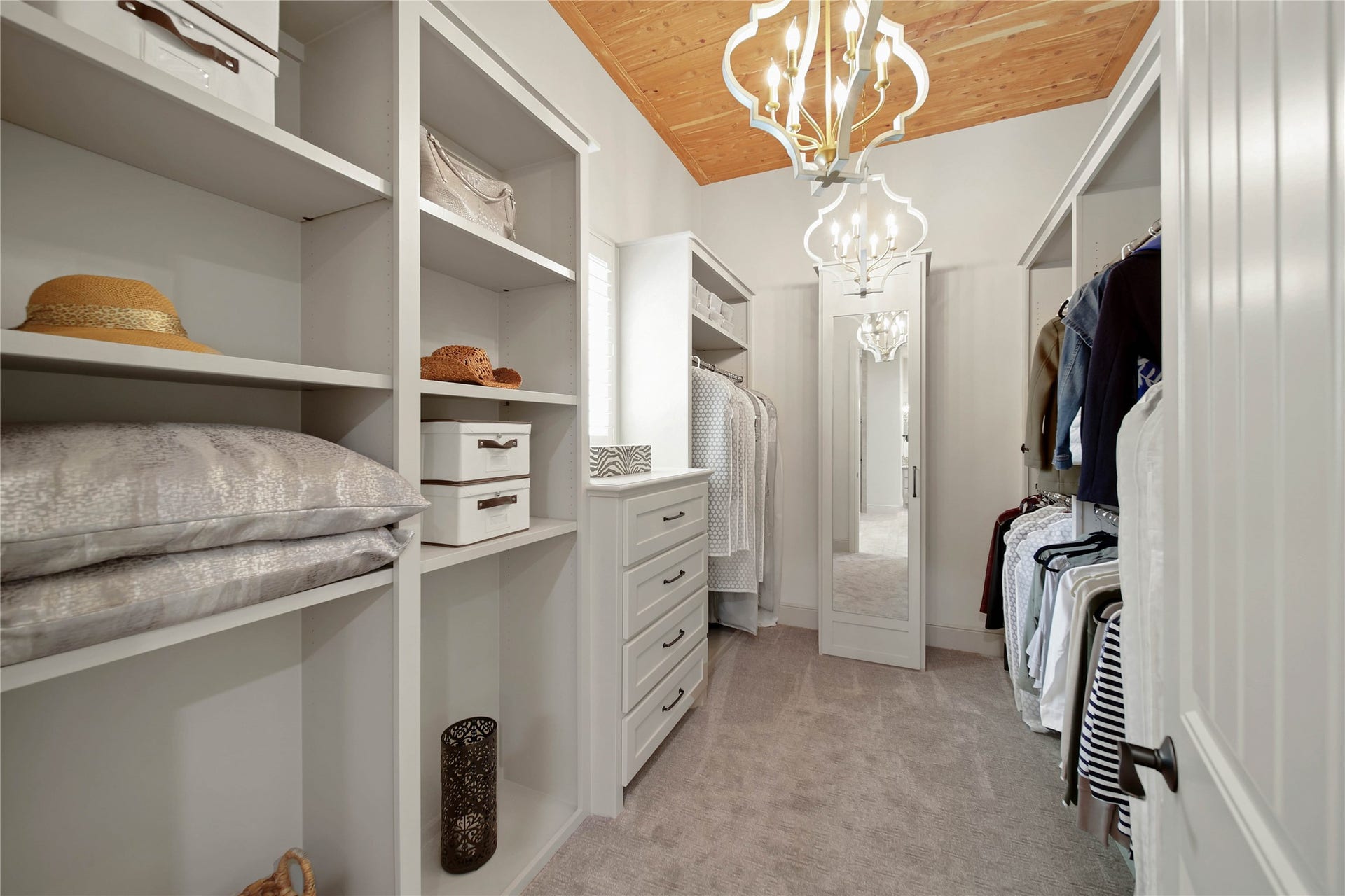 The primary suite features two upscale walk-in closets.