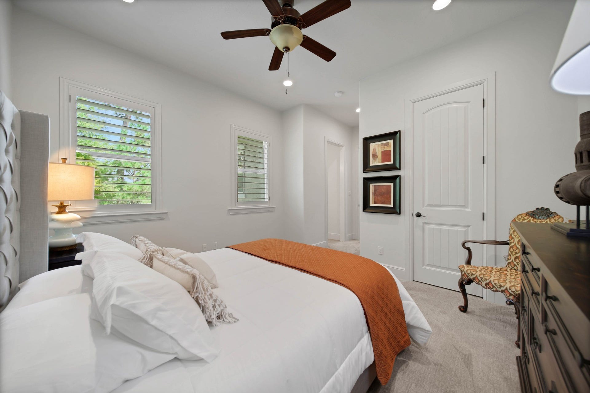 A comfortable bedroom gives overnight visits an inviting beginning. Soft light and a simple layout leave room for personal furnishings and an easy place to settle in.