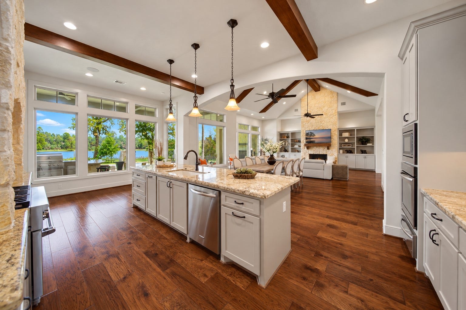 The kitchen is designed to make everyday moments feel effortless. A whole-home water filtration system provides better drinking water and prevents hardwater build-up, while a discreet appliance cabinet by the fridge and pull-out spice racks by the range keep everyday essentials within easy reach and your countertop clean and inviting.