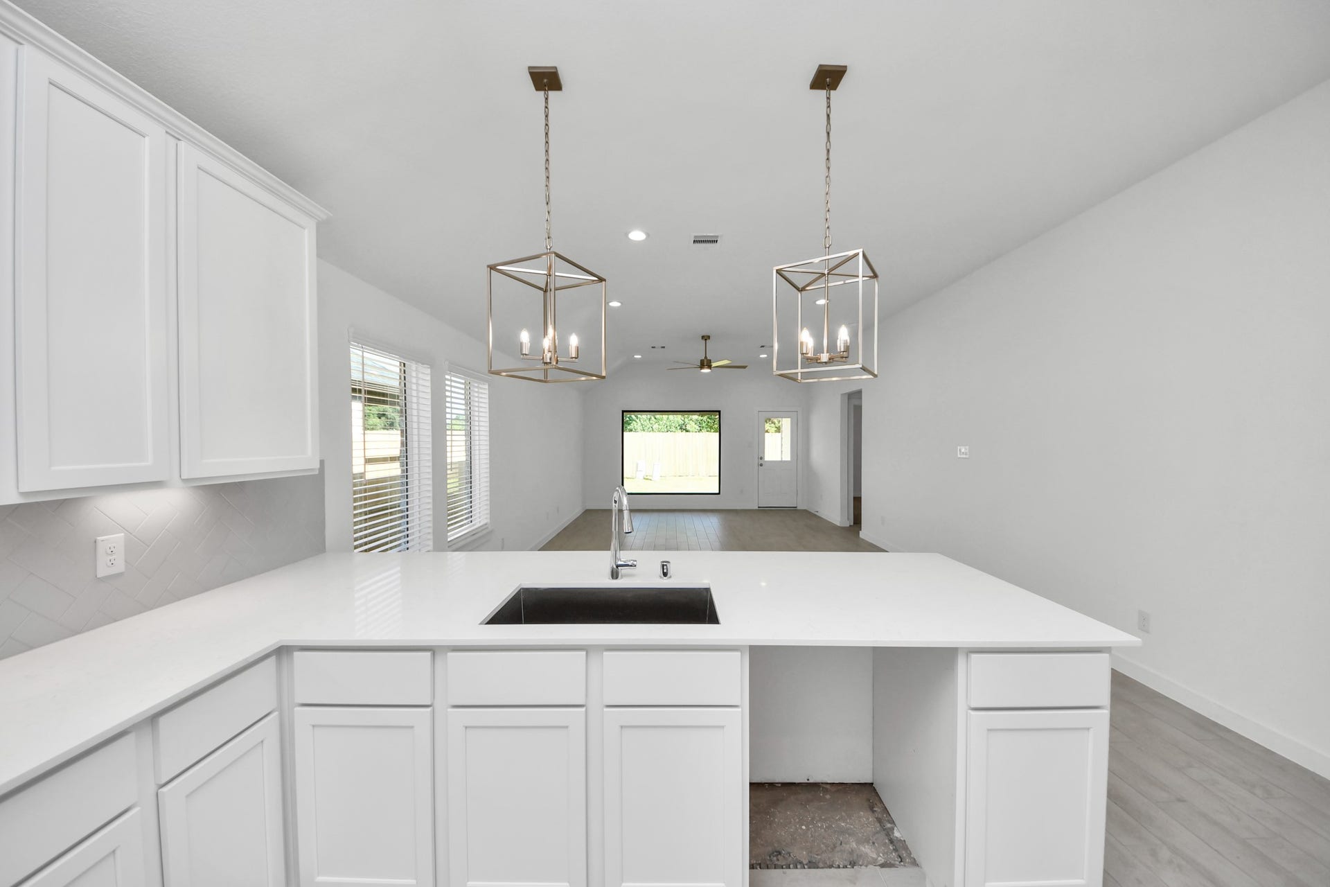 11015 Hosta Stream Drive, Houston, TX 77044 All of this overlooks your expansive family room, creating a perfect space for culinary delights and family gatherings. Sample photo of completed home with similar floor plan. Actual colors and selections may vary.