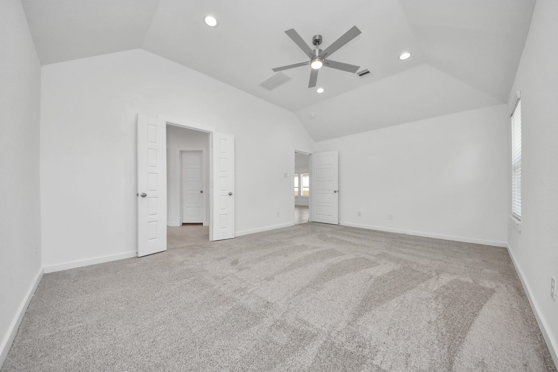 11015 Hosta Stream Drive, Houston, TX 77044 Another perspective unveils a comprehensive view of the serenity and comfort this primary suite offers. Sample photo of completed home with similar floor plan. Actual colors and selections may vary.