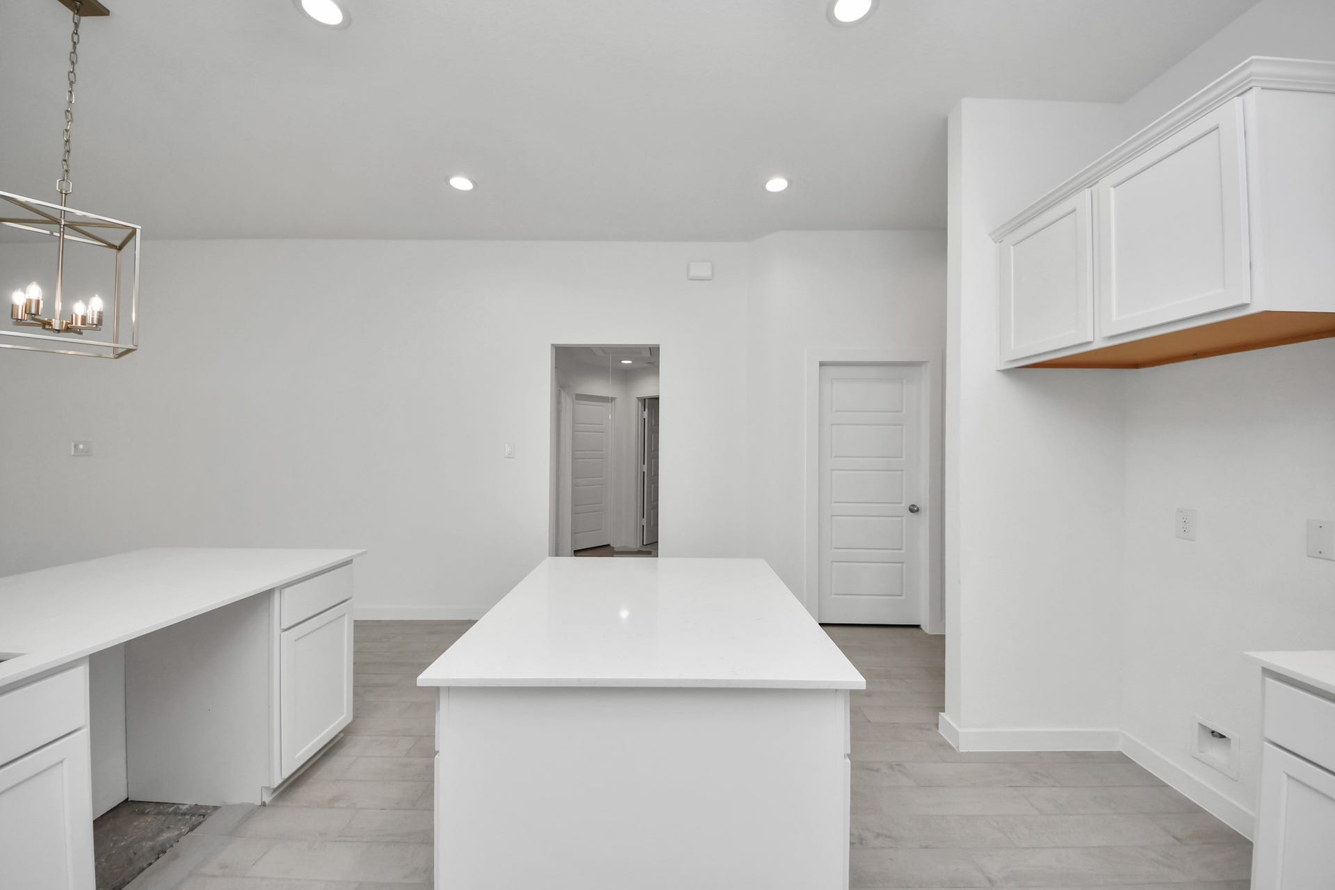 11015 Hosta Stream Drive, Houston, TX 77044 Discover another perspective of this stunning kitchen, generously appointed with an abundance of counter space. Sample photo of completed home with similar floor plan. Actual colors and selections may vary.