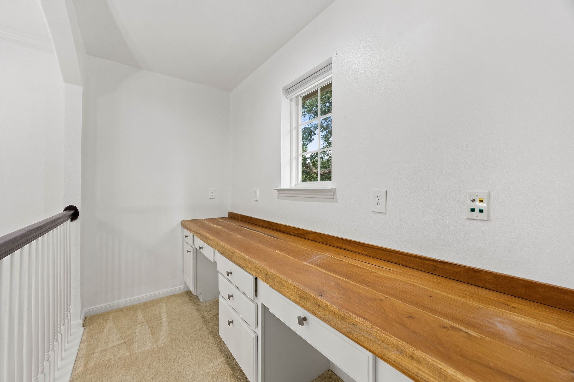 4730 Camden Brook Lane, Katy, TX 77494 Built-in workspace featuring a generous desktop, cabinetry, and convenient storage for a home office or study area.
