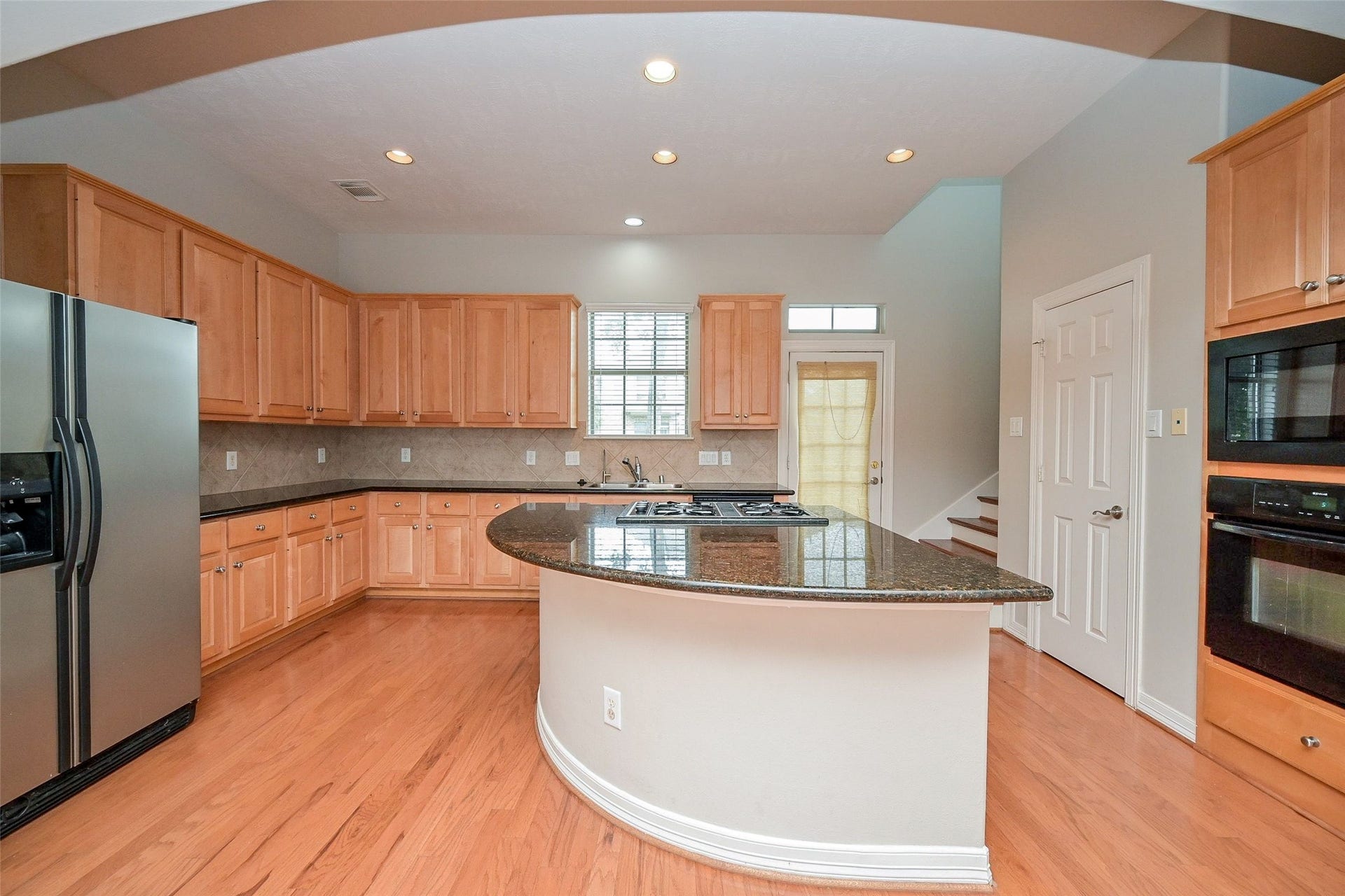 7933 Telluride Drive, Houston, TX 77040 Kitchen with Island that's open to the Living Room, great for Entertaining.