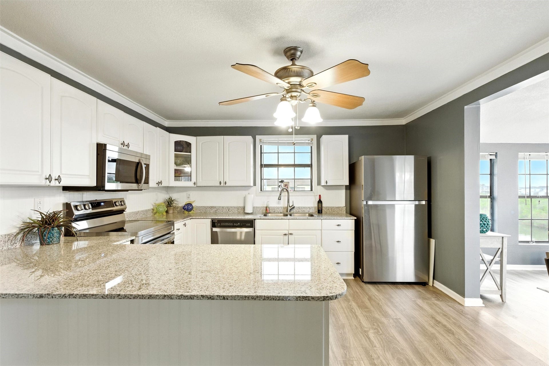 7215 Beau Rue Street, Hitchcock, TX 77563 Large kitchen with all new stainless steel appliances that are included