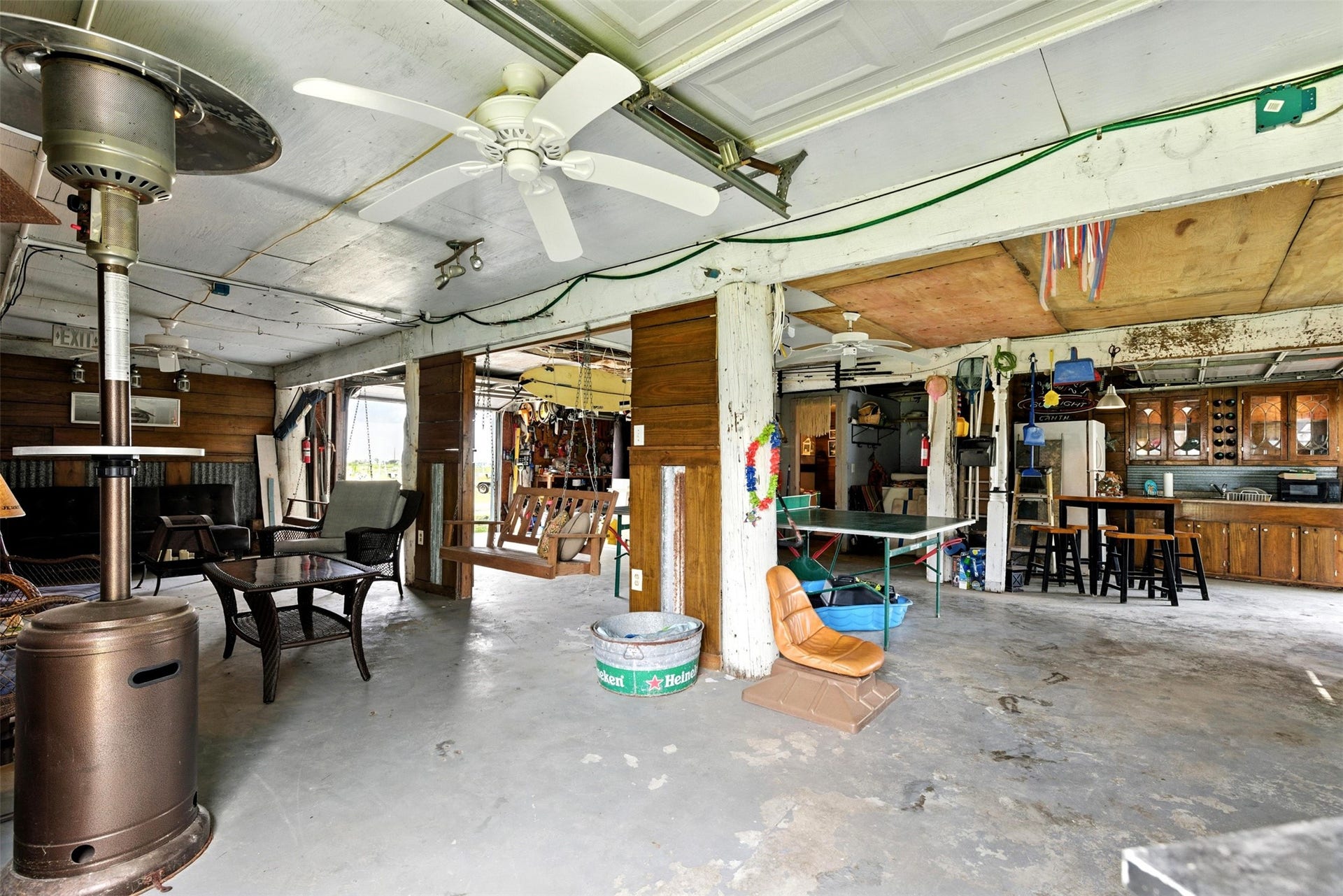 7215 Beau Rue Street, Hitchcock, TX 77563 so much room to entertain down below. All furnishings included