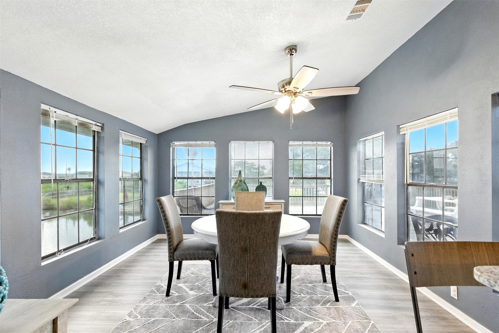 7215 Beau Rue Street, Hitchcock, TX 77563 the dining room has natural light and waterviews
