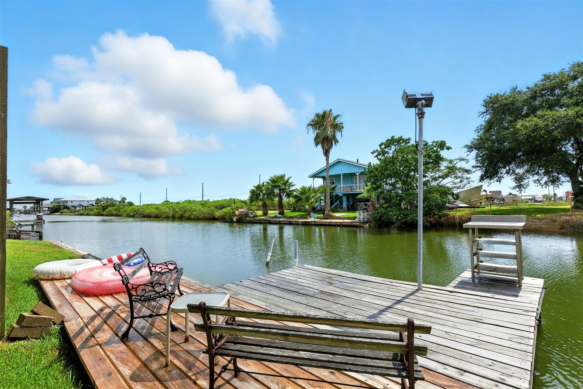 7215 Beau Rue Street, Hitchcock, TX 77563 private dock and canal access, fish cleaning station included