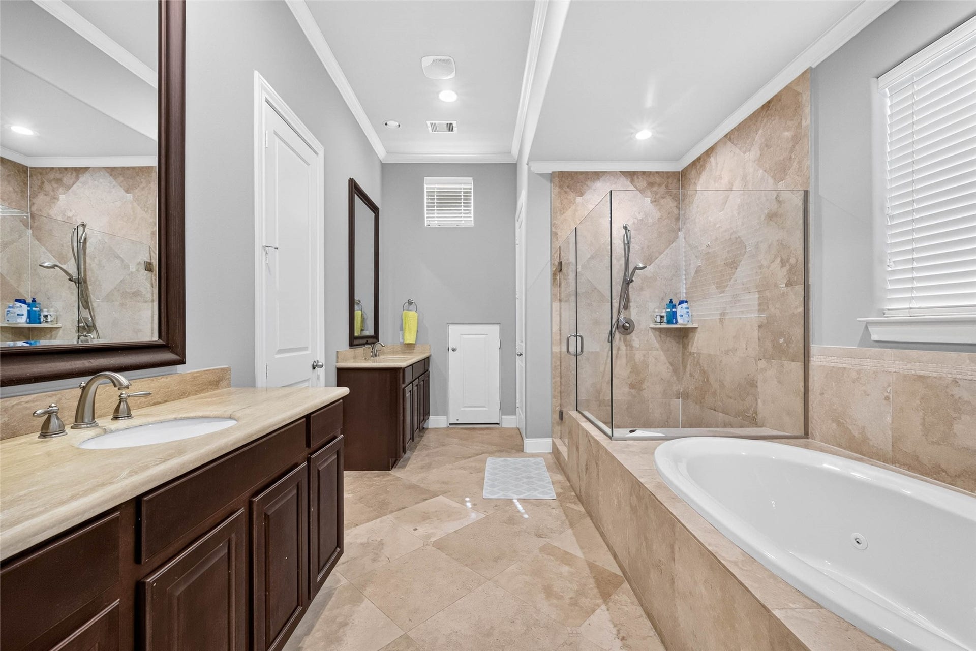 1207 Welch Street, Houston, TX 77006 Offering a convenient layout with the walk-in closet located directly within the primary bathroom, keeping everything easily accessible.