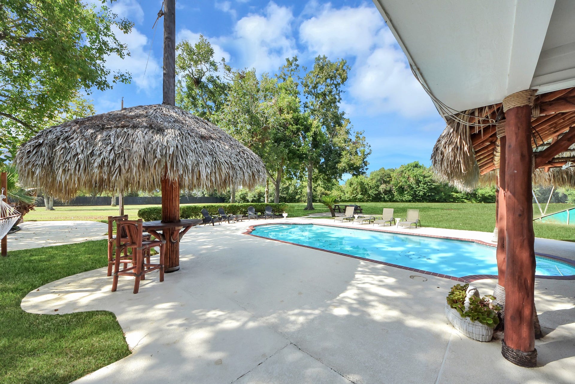 1910 Avenue L, Santa Fe, TX 77510 A backyard that feels like a retreat!