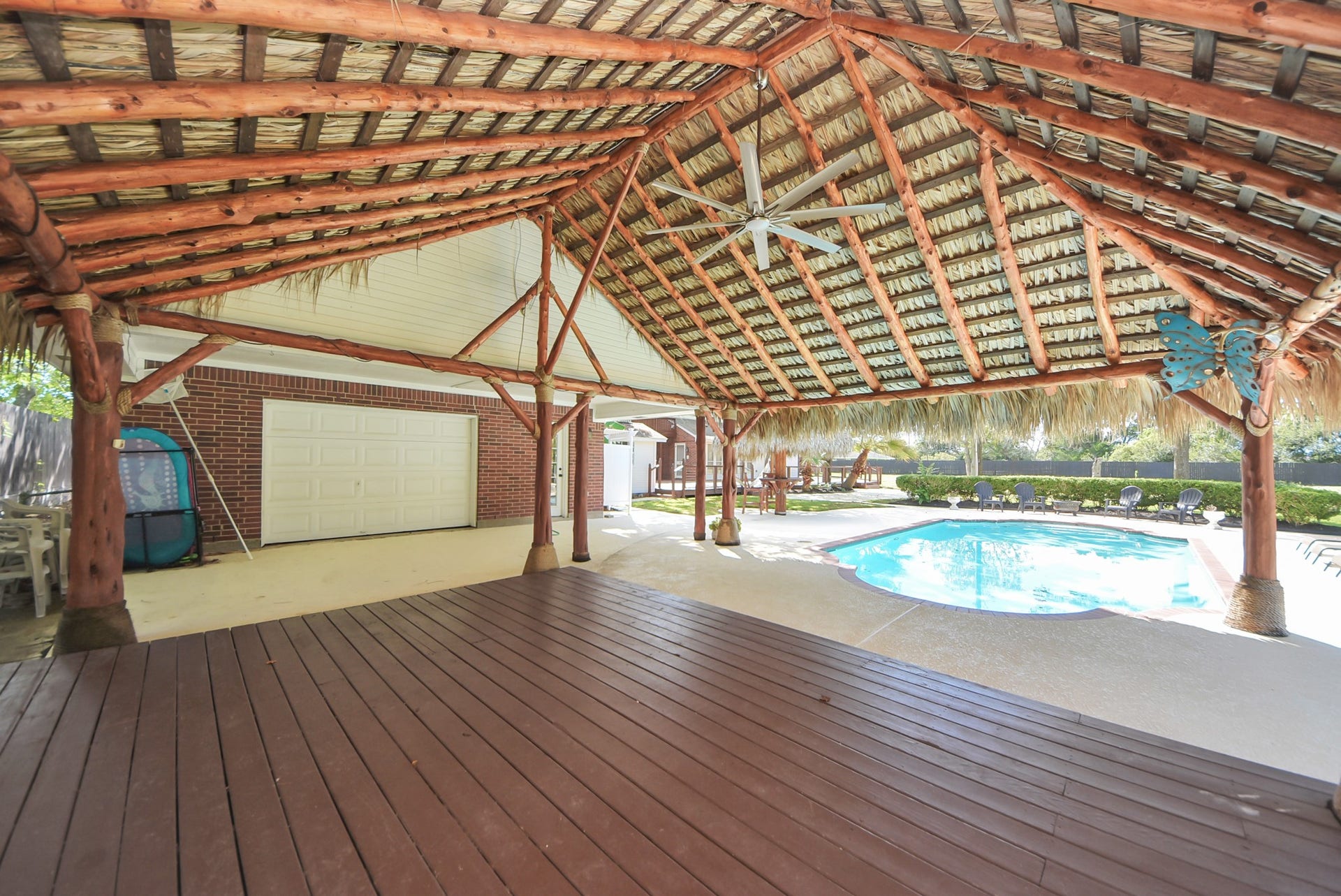 1910 Avenue L, Santa Fe, TX 77510 This big palapa porch perfect for those friends and family gatherings!