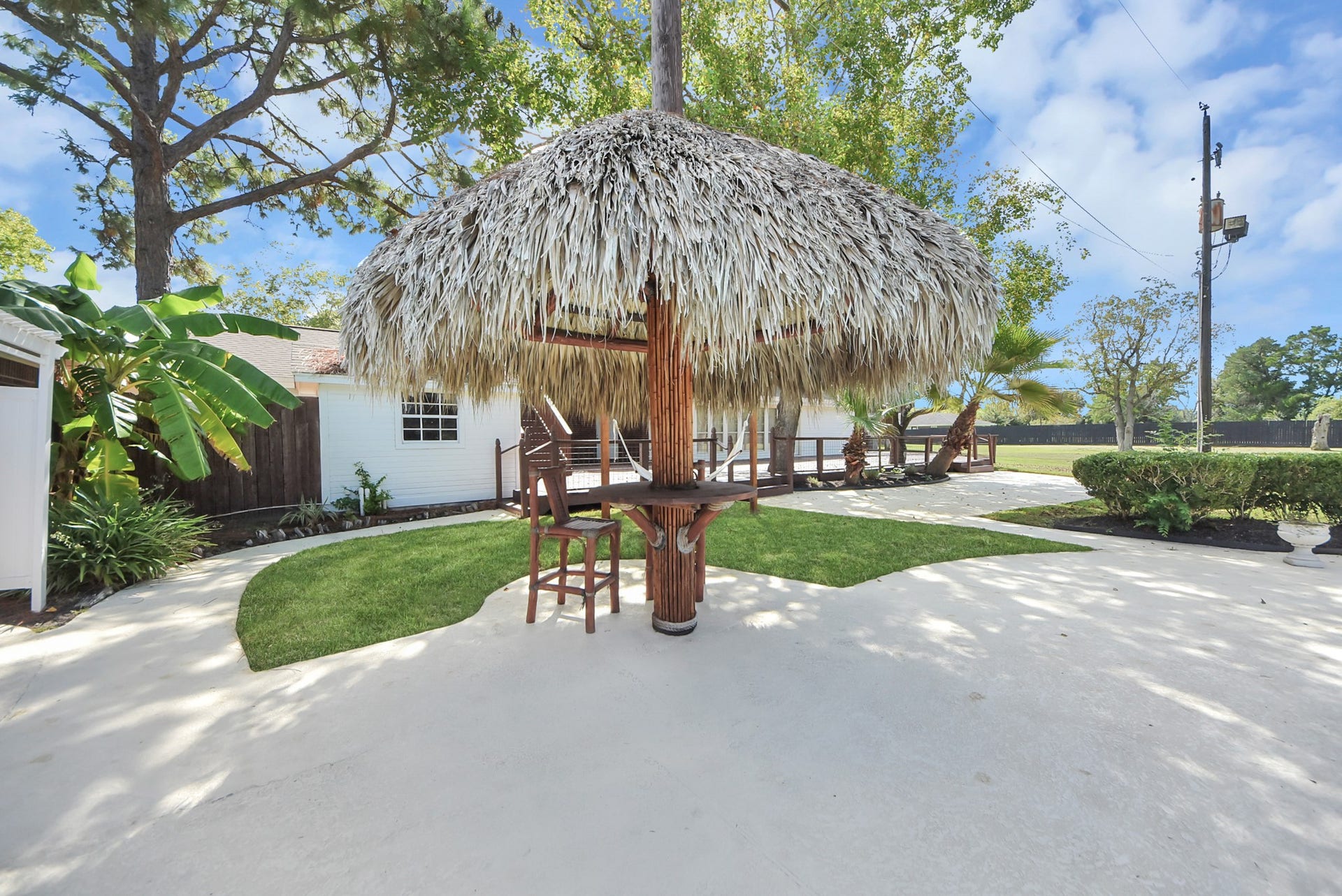 1910 Avenue L, Santa Fe, TX 77510 A dreamy small palapa for those late nights by the pool!