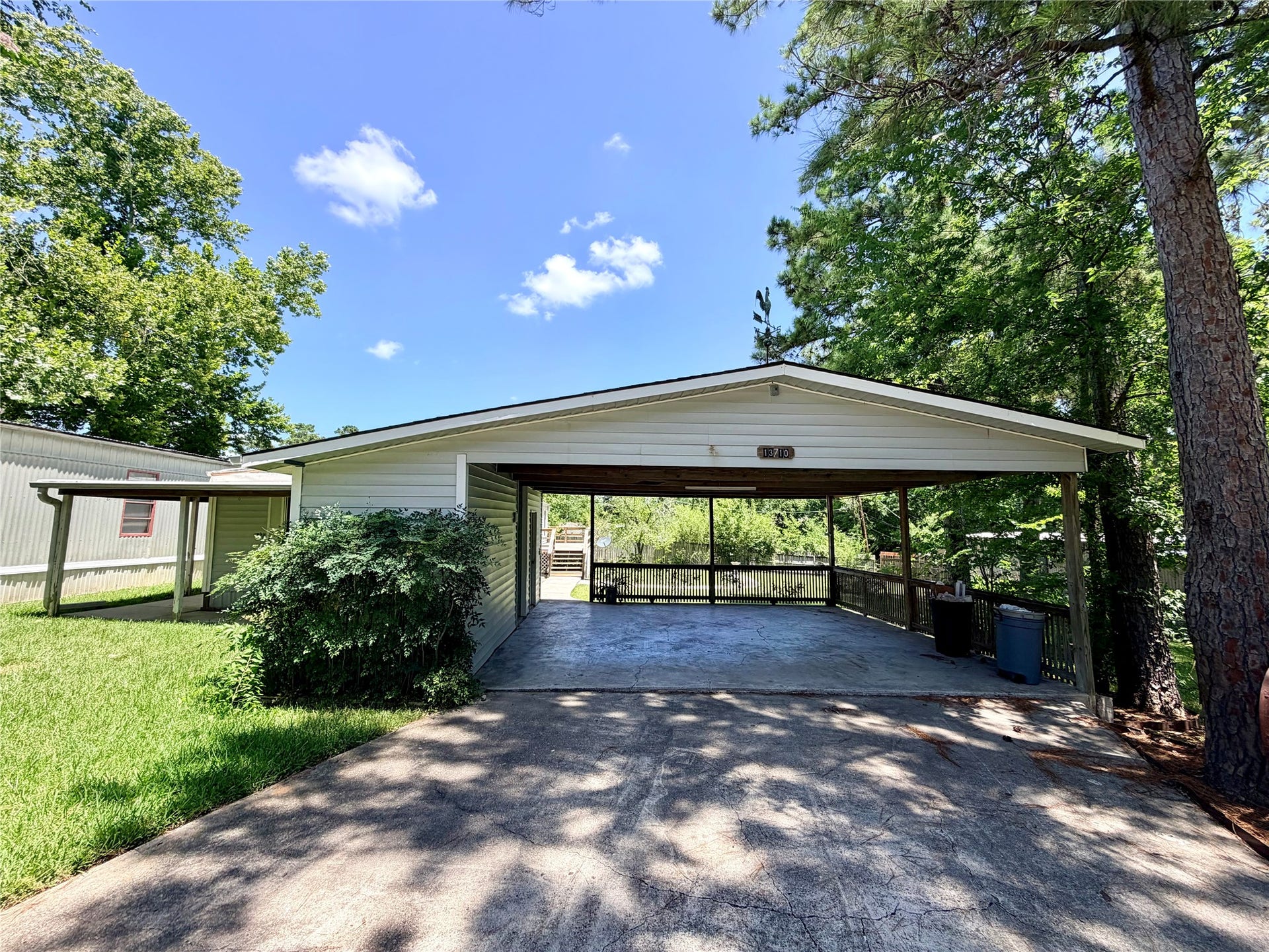 13710 Brigadier Drive, Willis, TX 77318 2 Car Carport & Six Car Driveway
