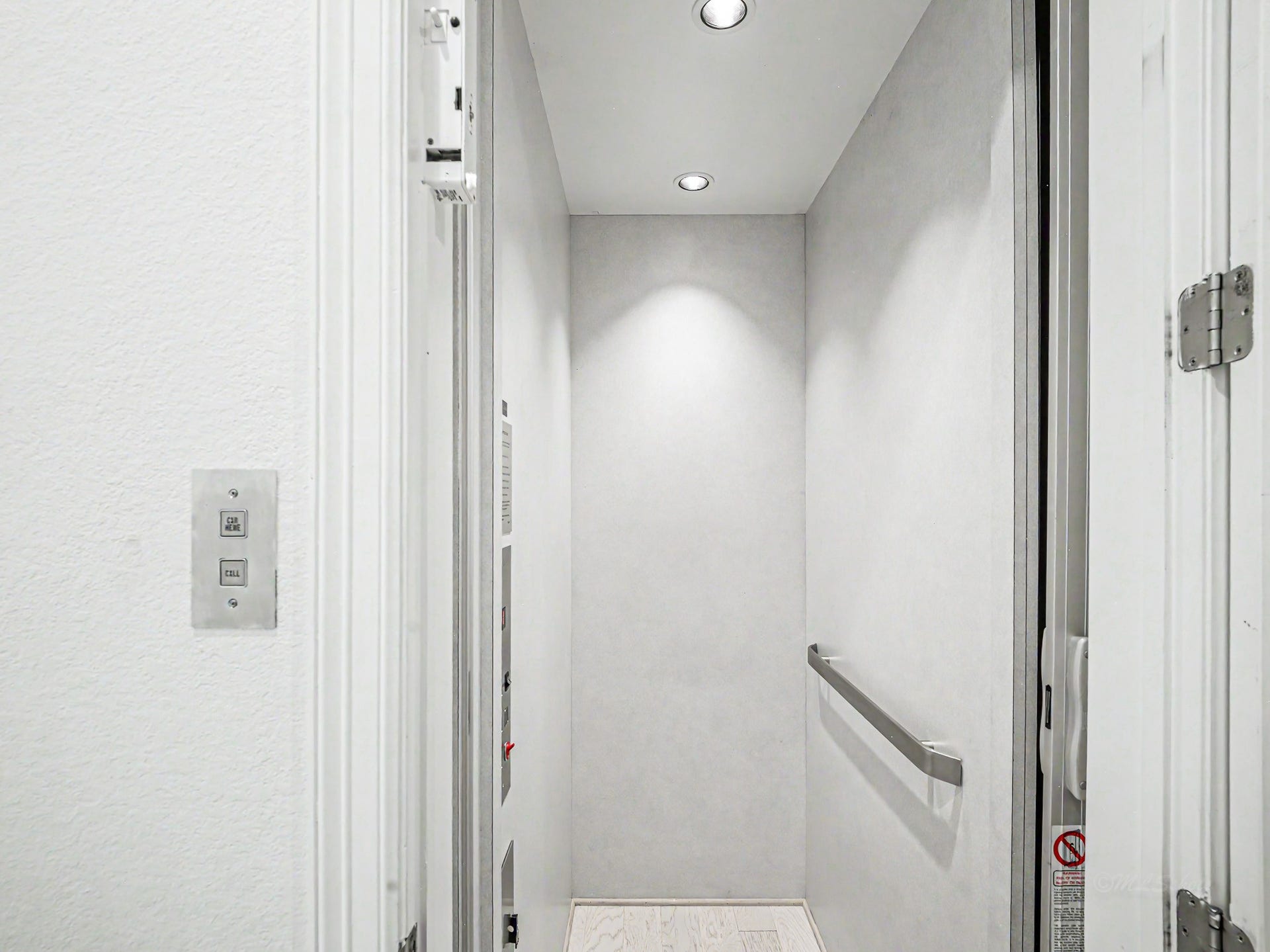Down the hallway is an elevator with a 950# capacity that runs to all 3 floors.