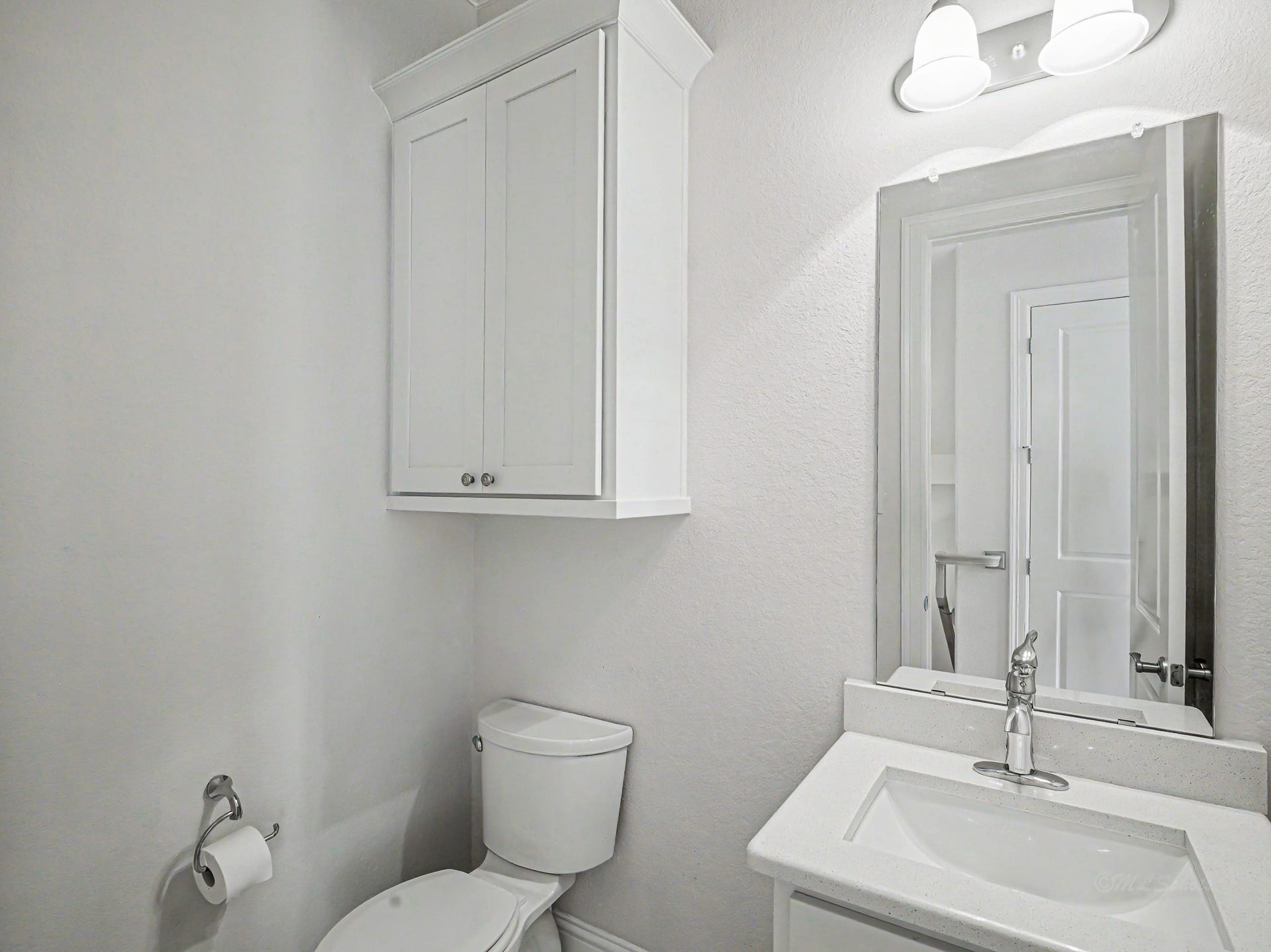 Coming up on the second floor you a half bath across from the elevator.