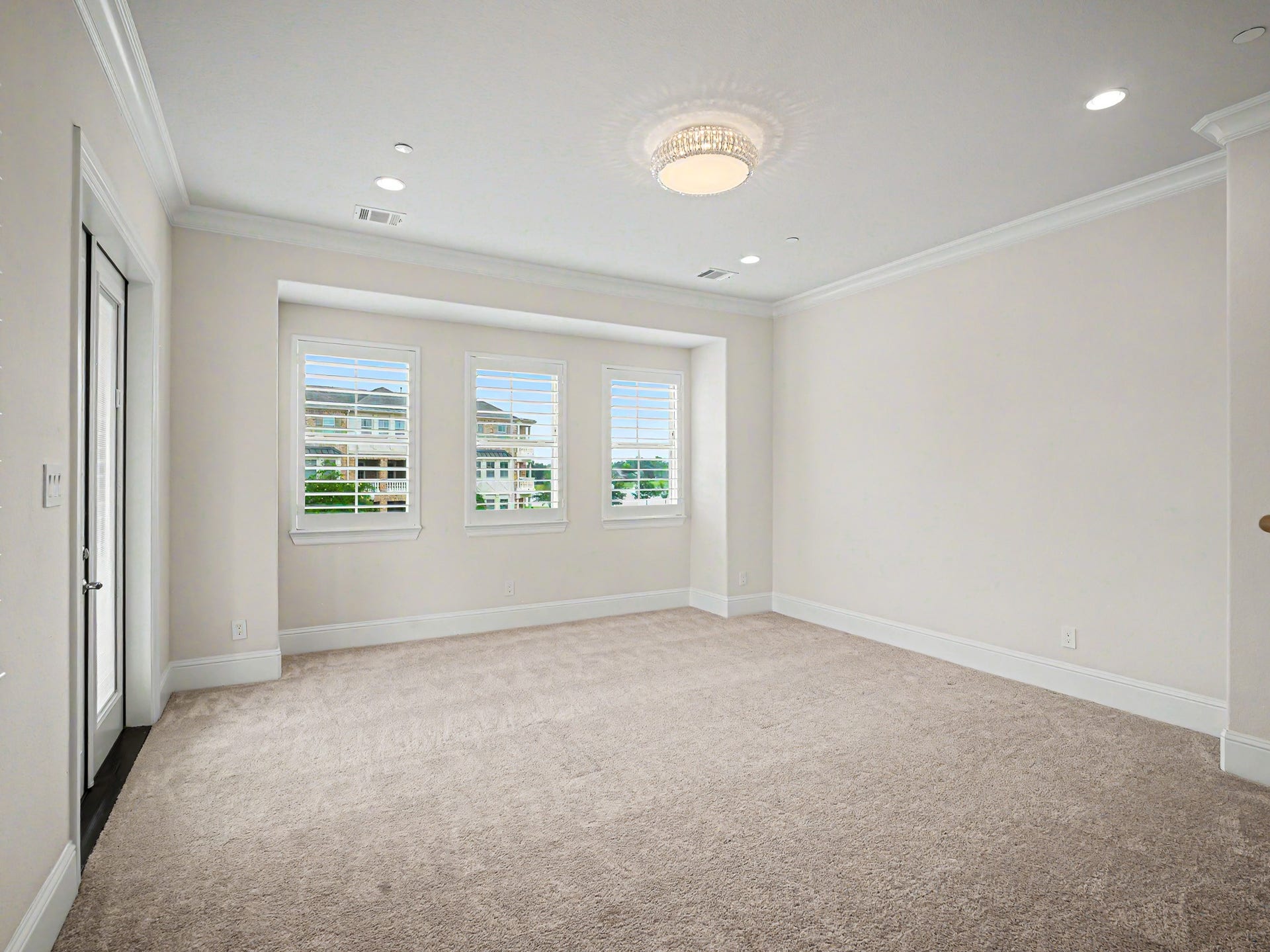 On the far side is the dining/flex/game room, you make the choice! View out front windows look out onto the lake across the street.