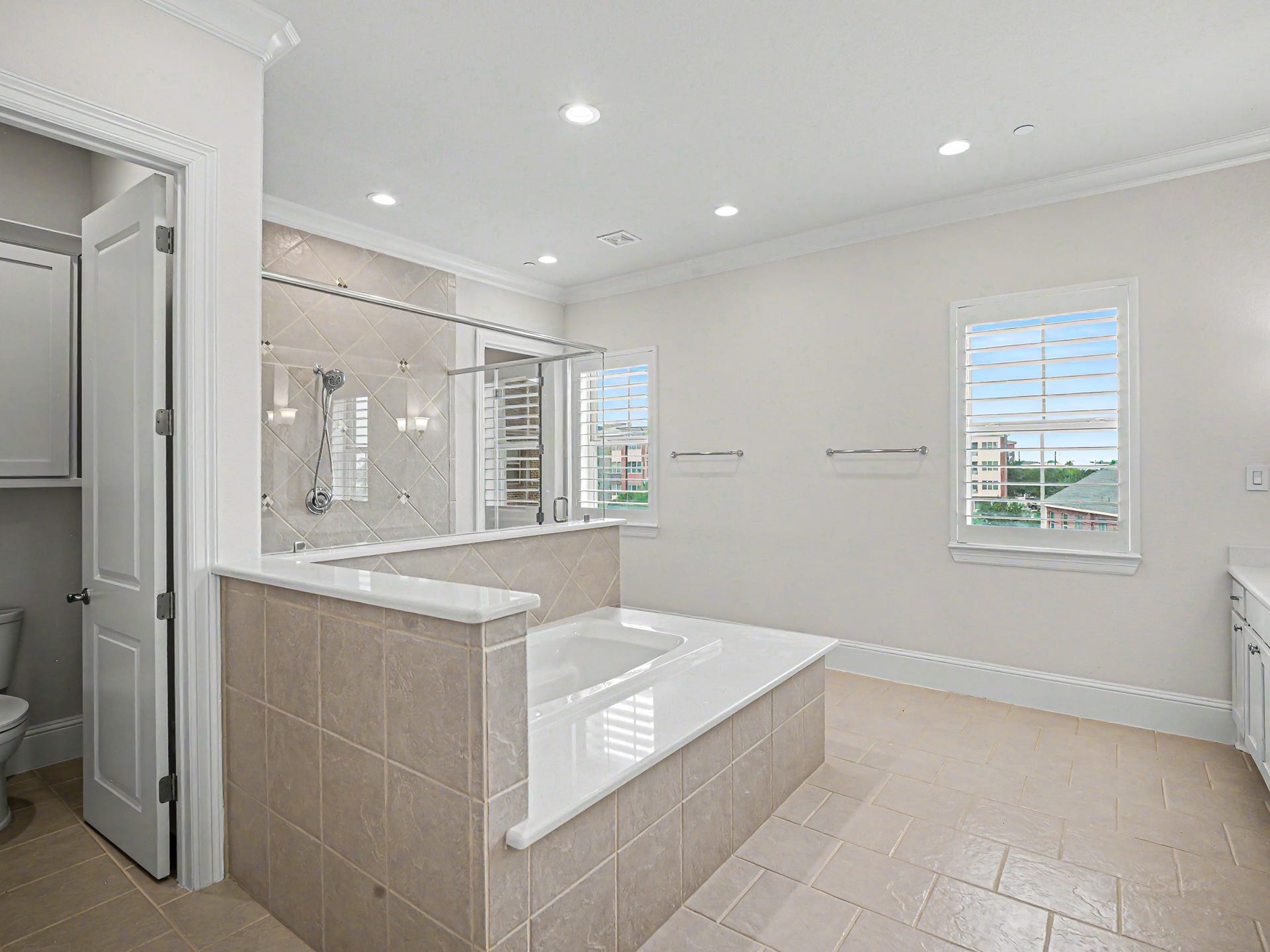 Closer view of the tub & shower.