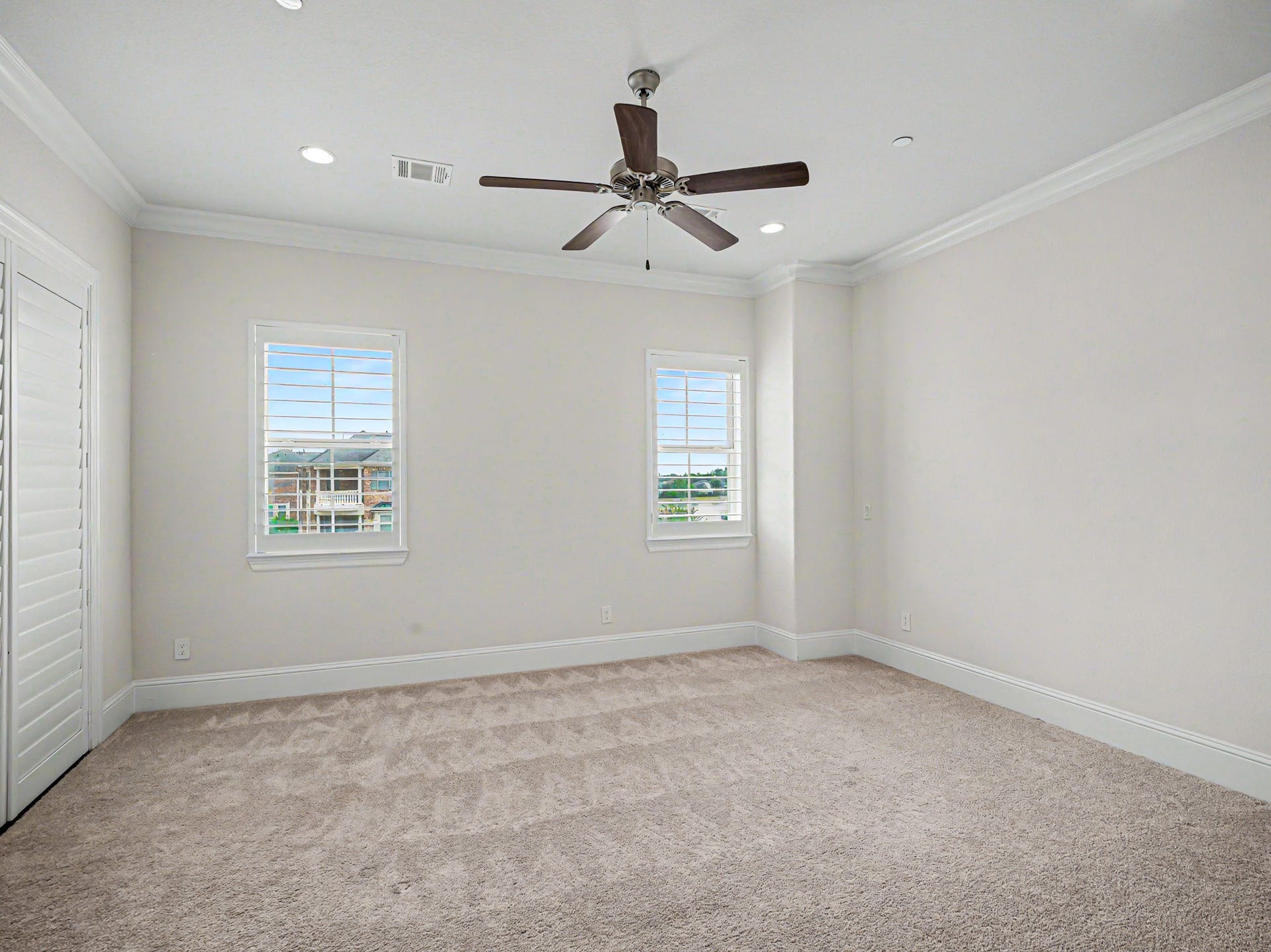 Welcome to the large Primary Suite with Plantation Shutters everywhere.