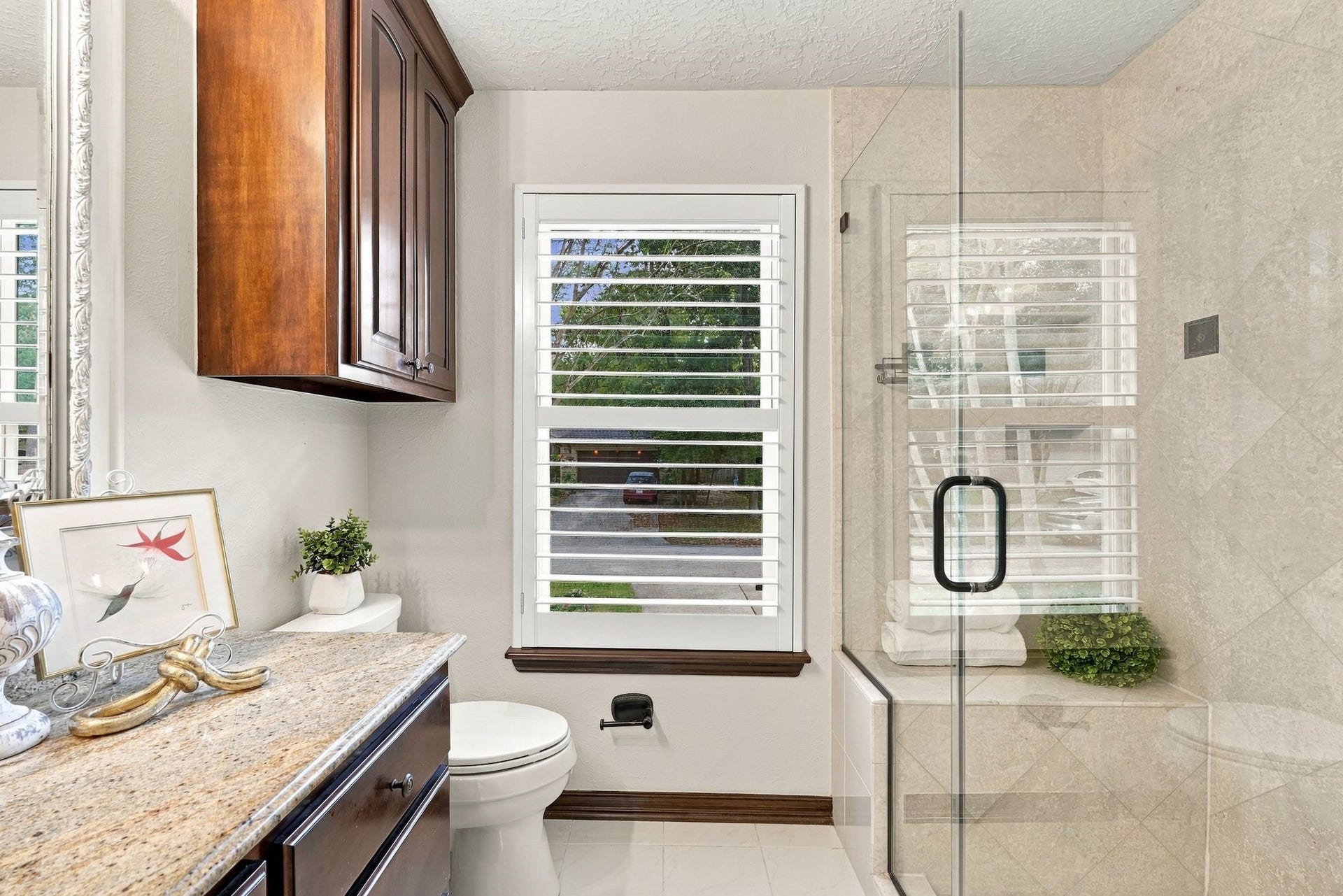 8 Diamond Oak Court, The Woodlands, TX 77381 Another view of the primary bathroom with the elegant walk in shower.