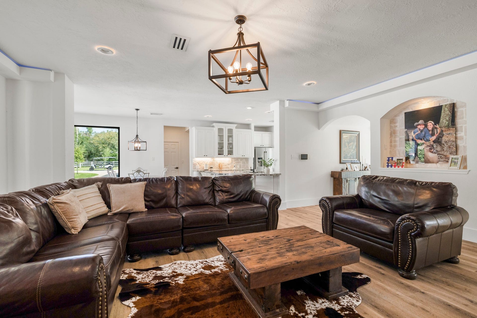 31219 Edgewater Drive, Magnolia, TX 77354 From here, the open layout connects the living room to the kitchen and entry.