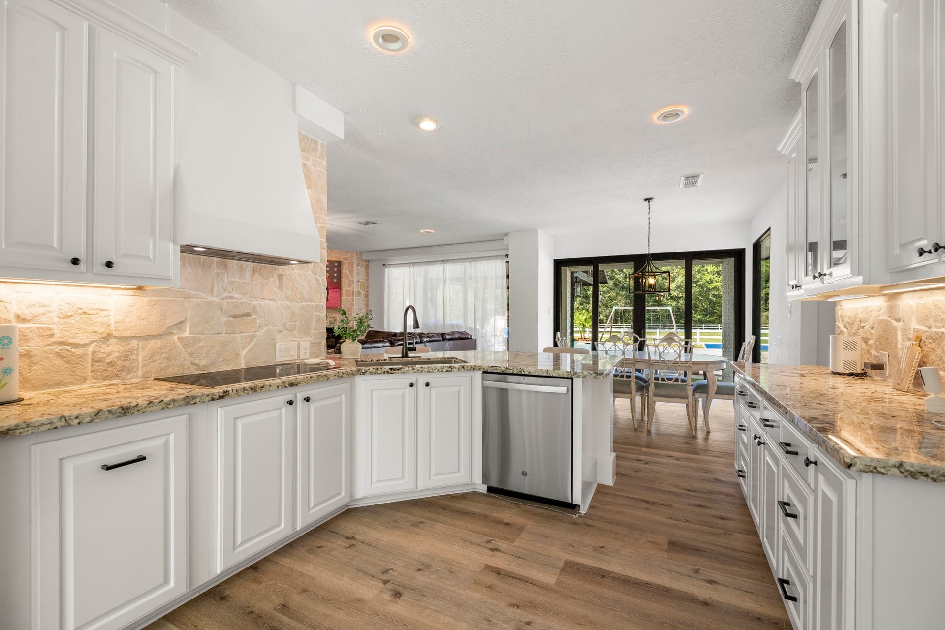 31219 Edgewater Drive, Magnolia, TX 77354 Another view of the kitchen highlights its generous counter space and cabinetry.