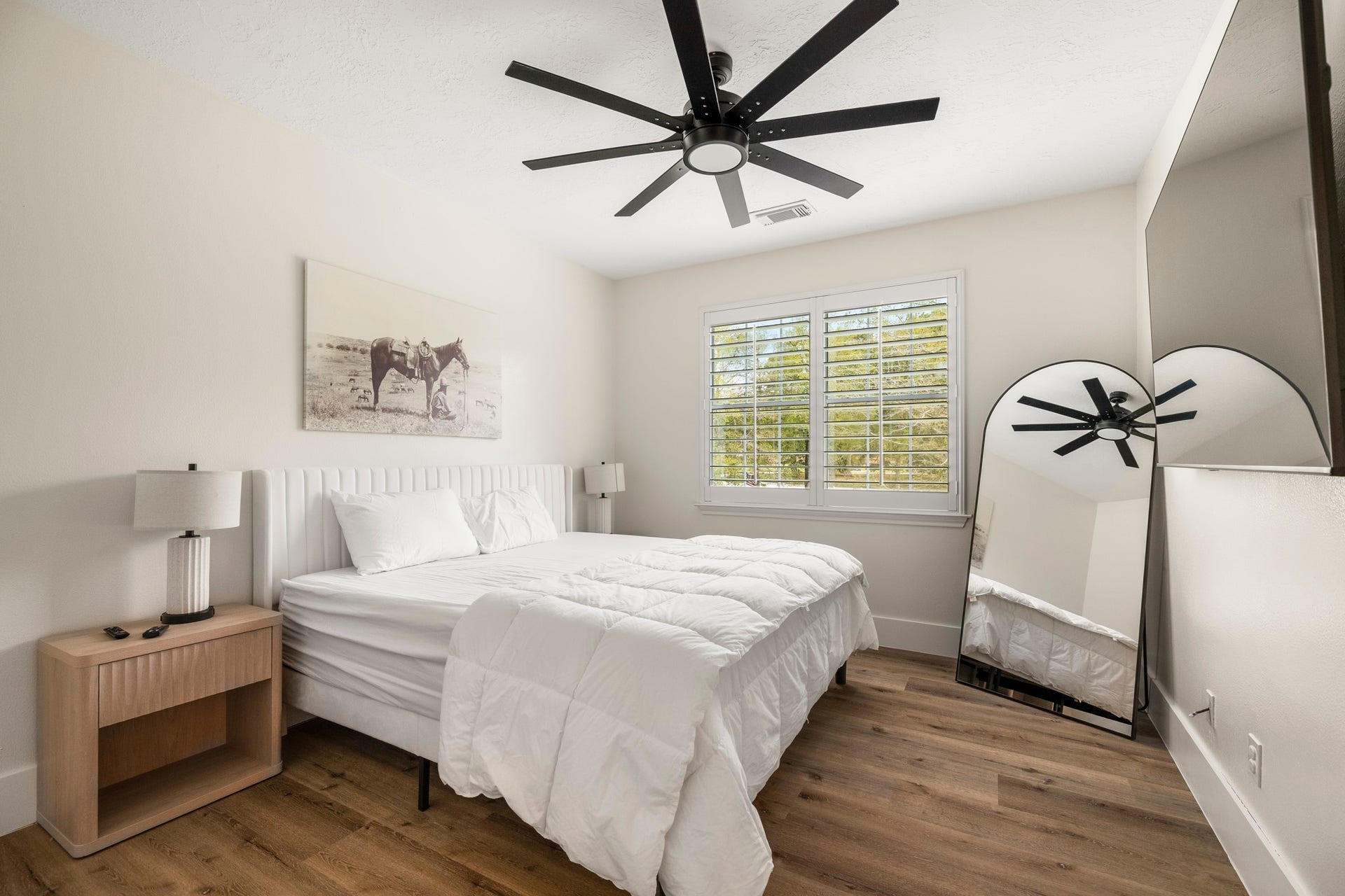 31219 Edgewater Drive, Magnolia, TX 77354 Another bedroom enjoys views of the grounds through its window.