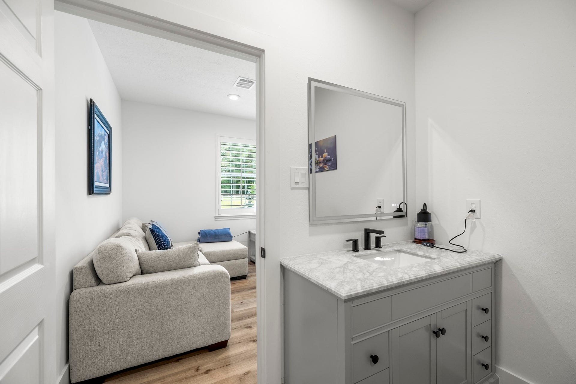 31219 Edgewater Drive, Magnolia, TX 77354 This view connects the bedroom to its ensuite bathroom and vanity.
