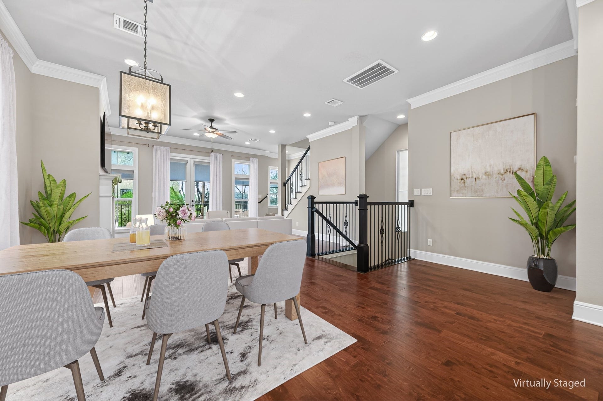 1429 W 21st Street, Houston, TX 77008 Dining area is open - offering multiple ways to arrange the open living and dining area. Here we are looking toward the stairs and all those great windows at the balcony.