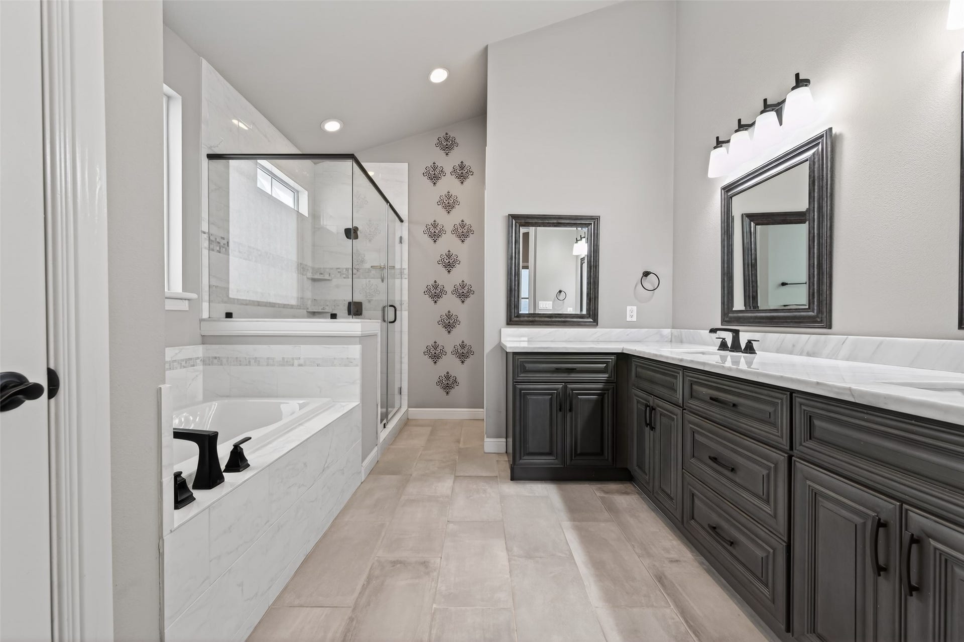 1429 W 21st Street, Houston, TX 77008 Quality sophisticated finishes in the bathroom also! Loads of countertop space, separate tub and large shower.