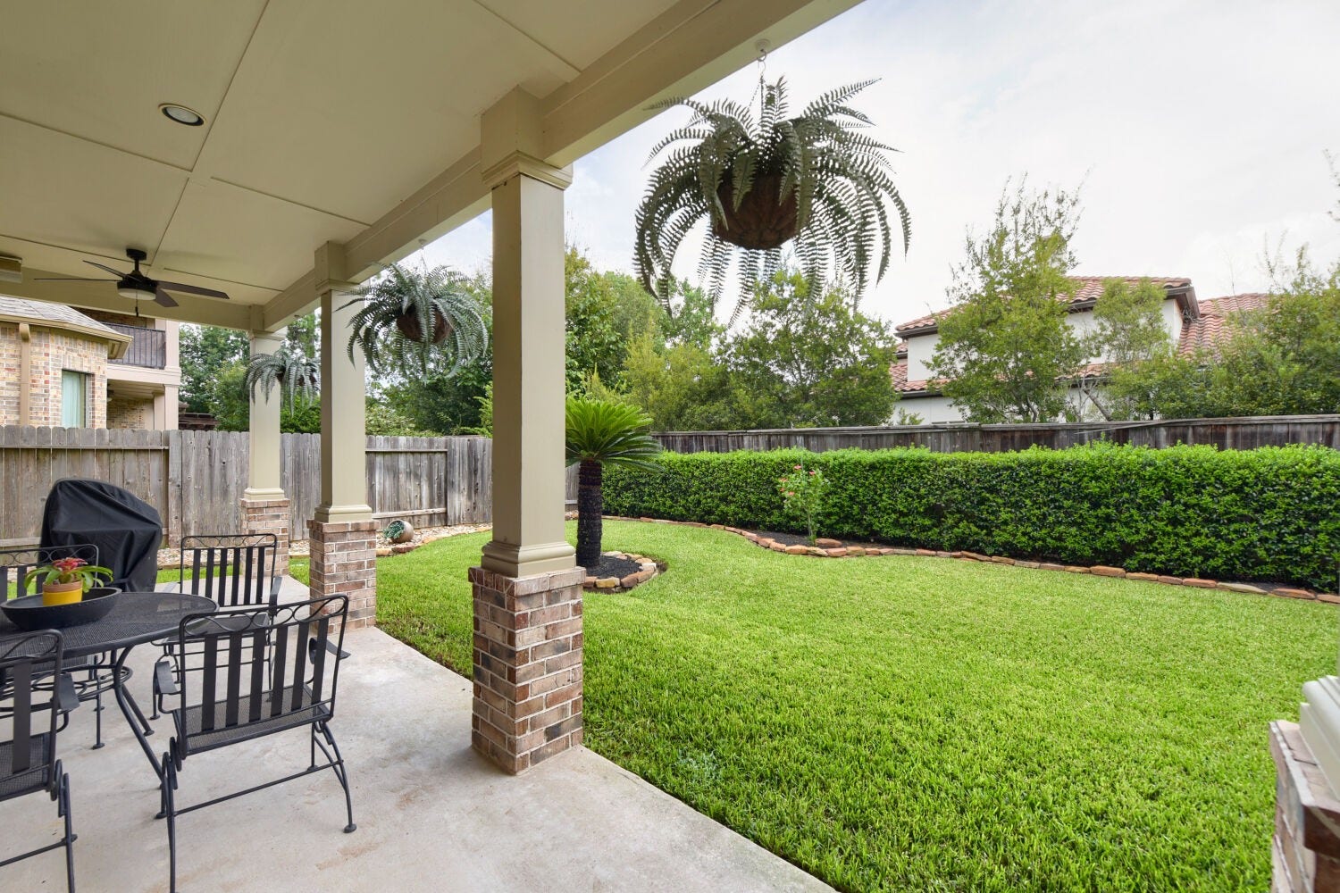 14 Knights Crossing Drive, The Woodlands, TX 77382 Covered patio and view of the backyard garden