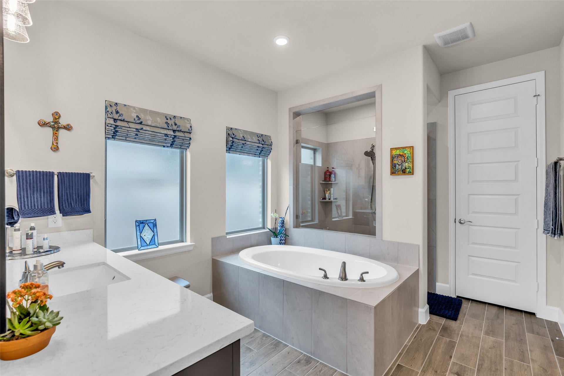 14858 Whistling Duck Lane, Magnolia, TX 77354 The luxurious spa-like primary bath includes soaking tub and large walk-in shower.