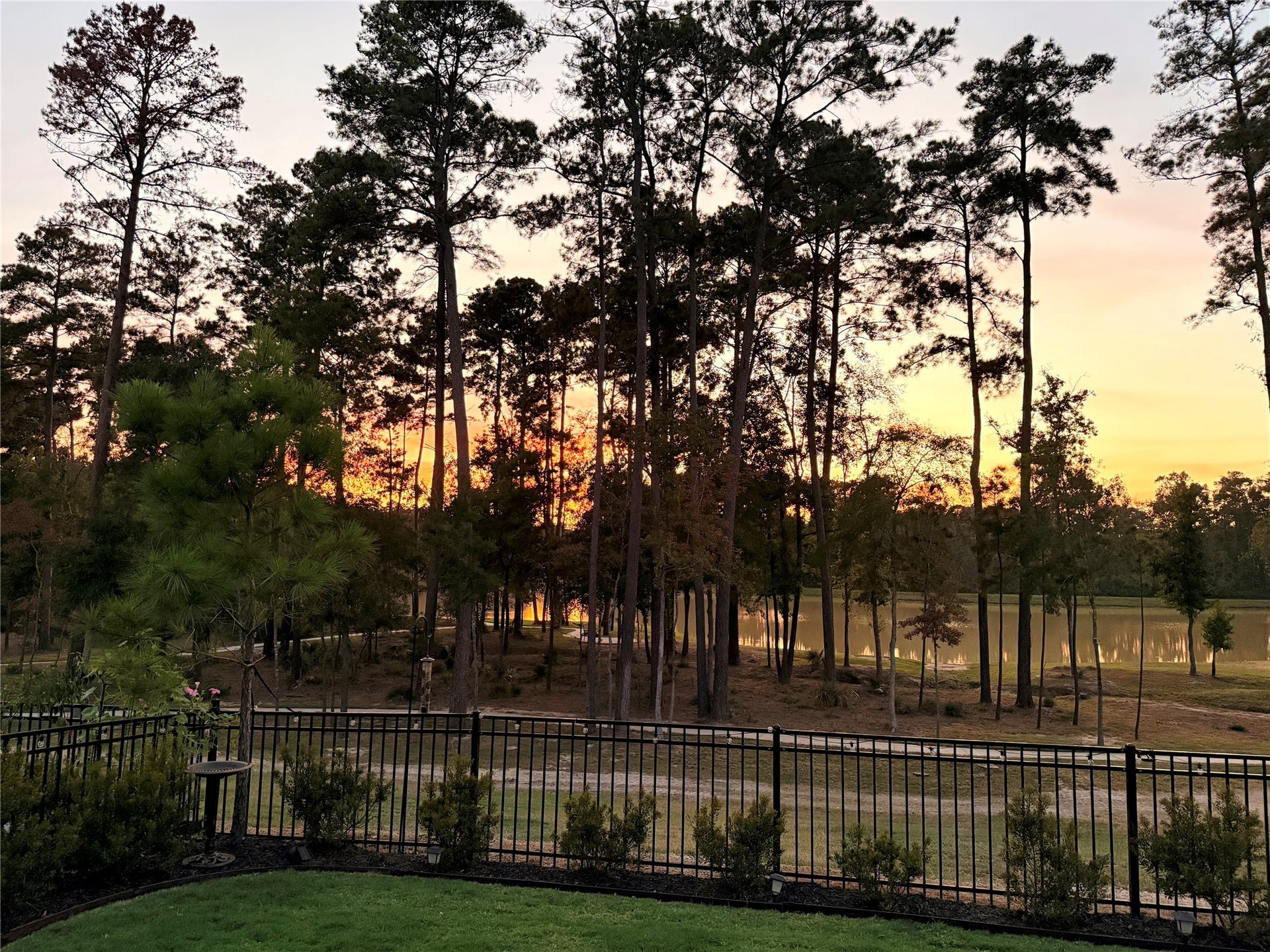 14858 Whistling Duck Lane, Magnolia, TX 77354 Discover tranquil sunsets as you enjoy the surrounding beauty.