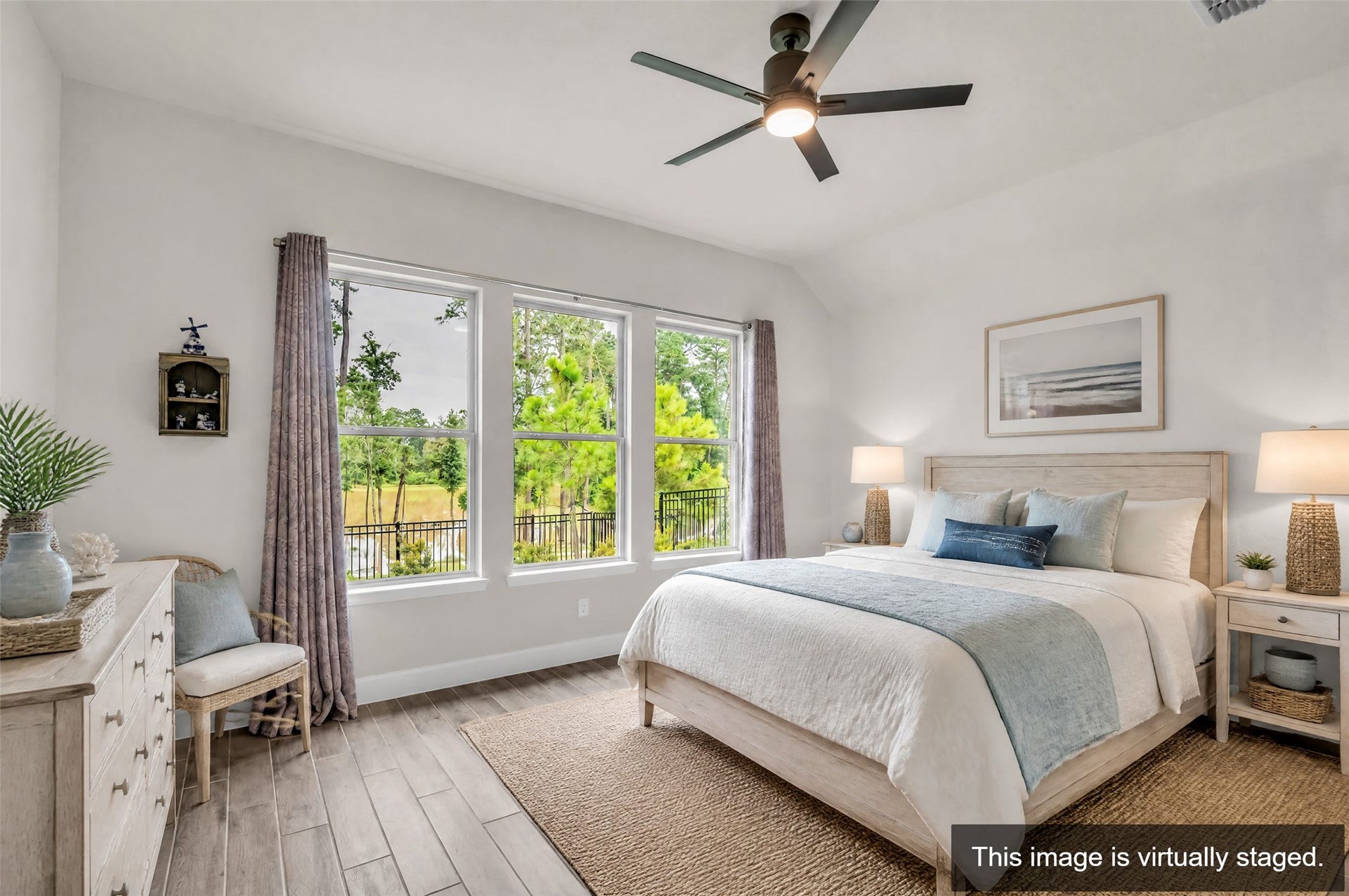 14858 Whistling Duck Lane, Magnolia, TX 77354 The Primary bedroom has its own view of the lake. (Virtually Staged)