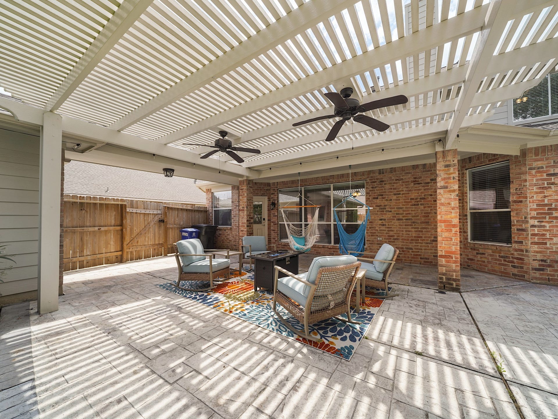 26214 Seminole Hill Lane, Katy, TX 77494 Whether hosting weekend gatherings or enjoying a quiet evening outdoors, this expansive covered patio was designed for relaxation and connection.