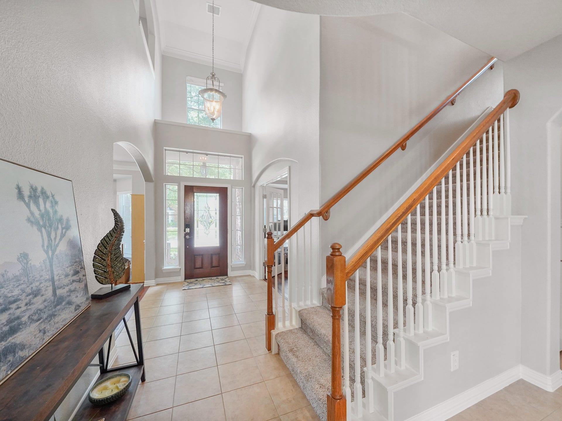 26214 Seminole Hill Lane, Katy, TX 77494 As you move through the home, open sightlines and the graceful staircase create a sense of space while drawing you toward the heart of the home.