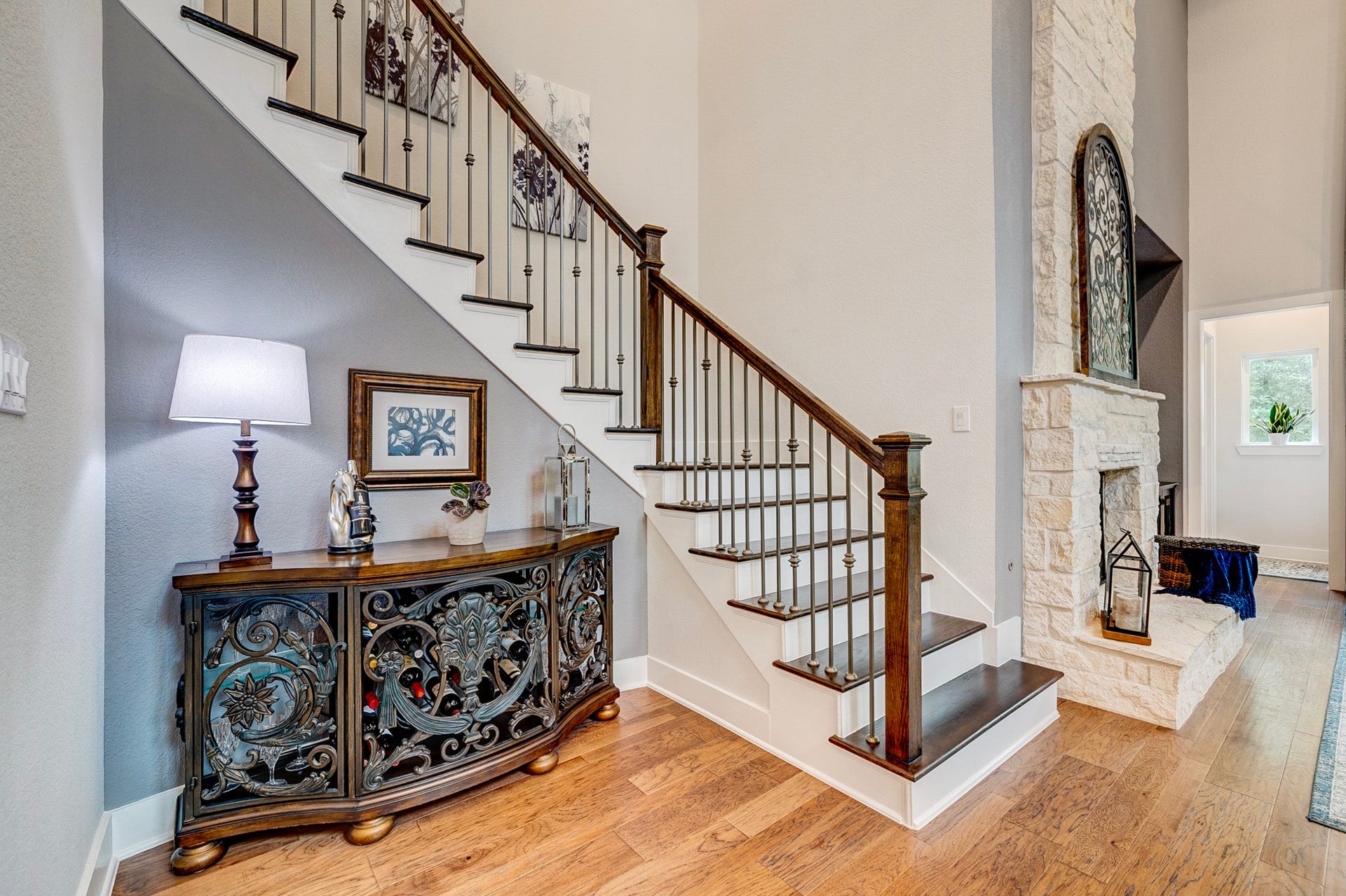 121 Sugar Pine Court, Montgomery, TX 77316 Stunning hardwood staircase featuring custom craftsmanship and upgraded finishes throughout.