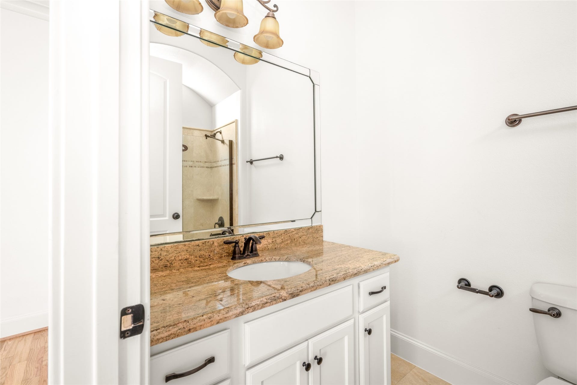 5218 Feagan Street, #D, Houston, TX 77007 First-floor bathroom with granite countertops.