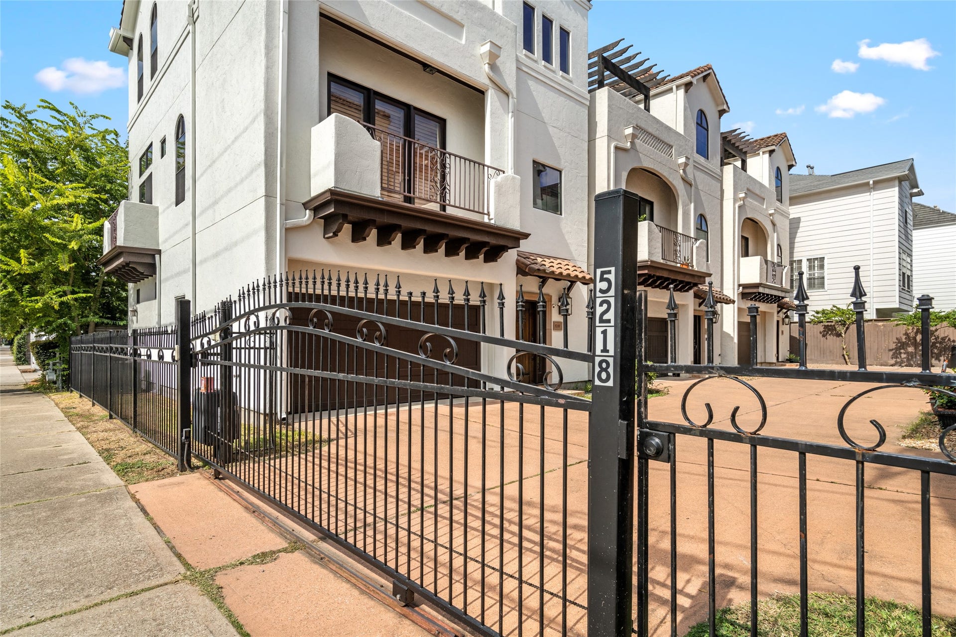 5218 Feagan Street, #D, Houston, TX 77007 The six-townhome community has a security gate.