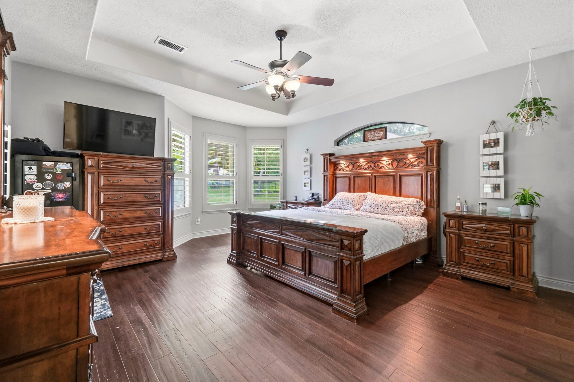 11612 Princess Ann Court, Montgomery, TX 77316 Huge primary bedroom dowstairs has views of the resort style backyard.