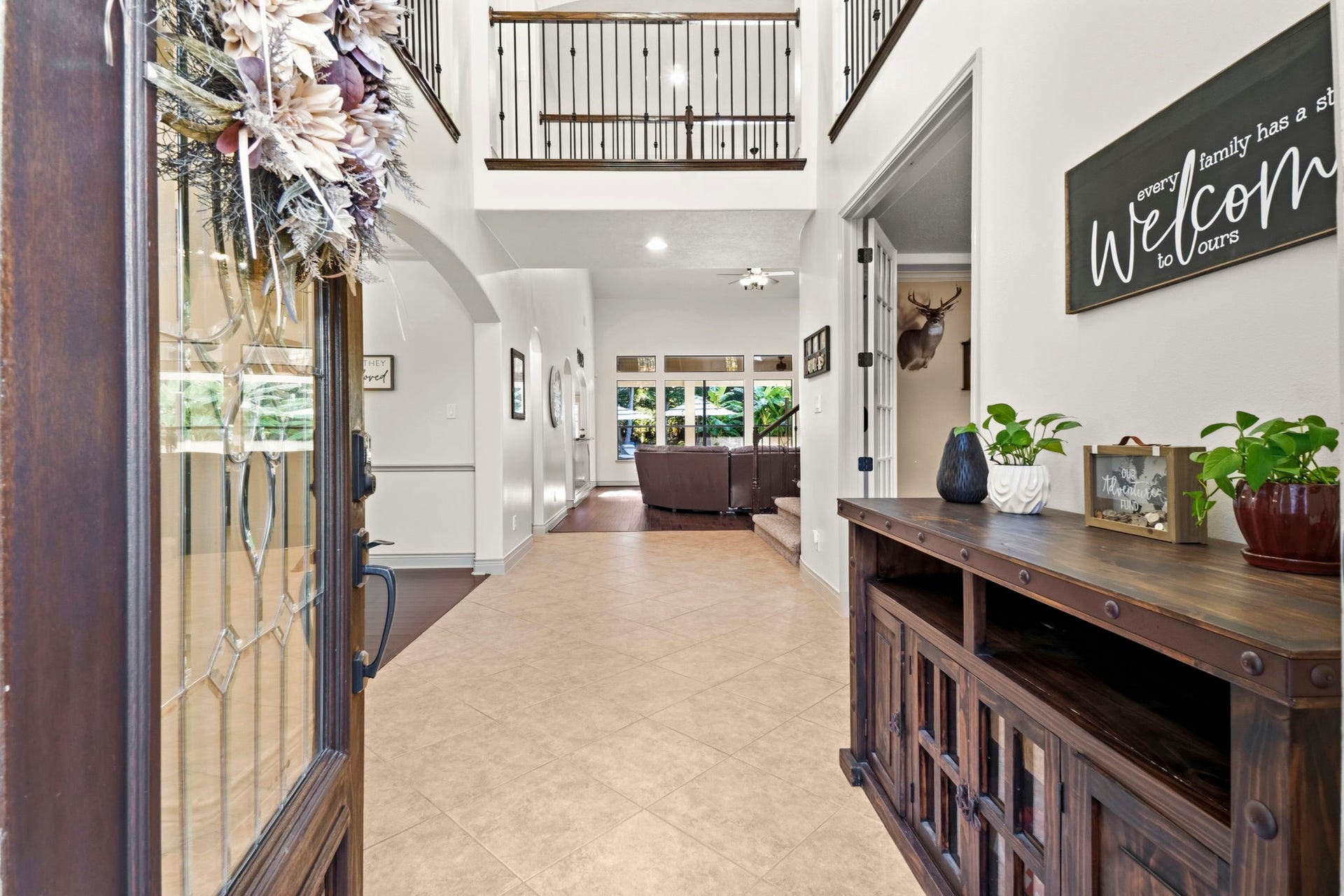 11612 Princess Ann Court, Montgomery, TX 77316 Grand two-story foyer with views straight to the backyard.