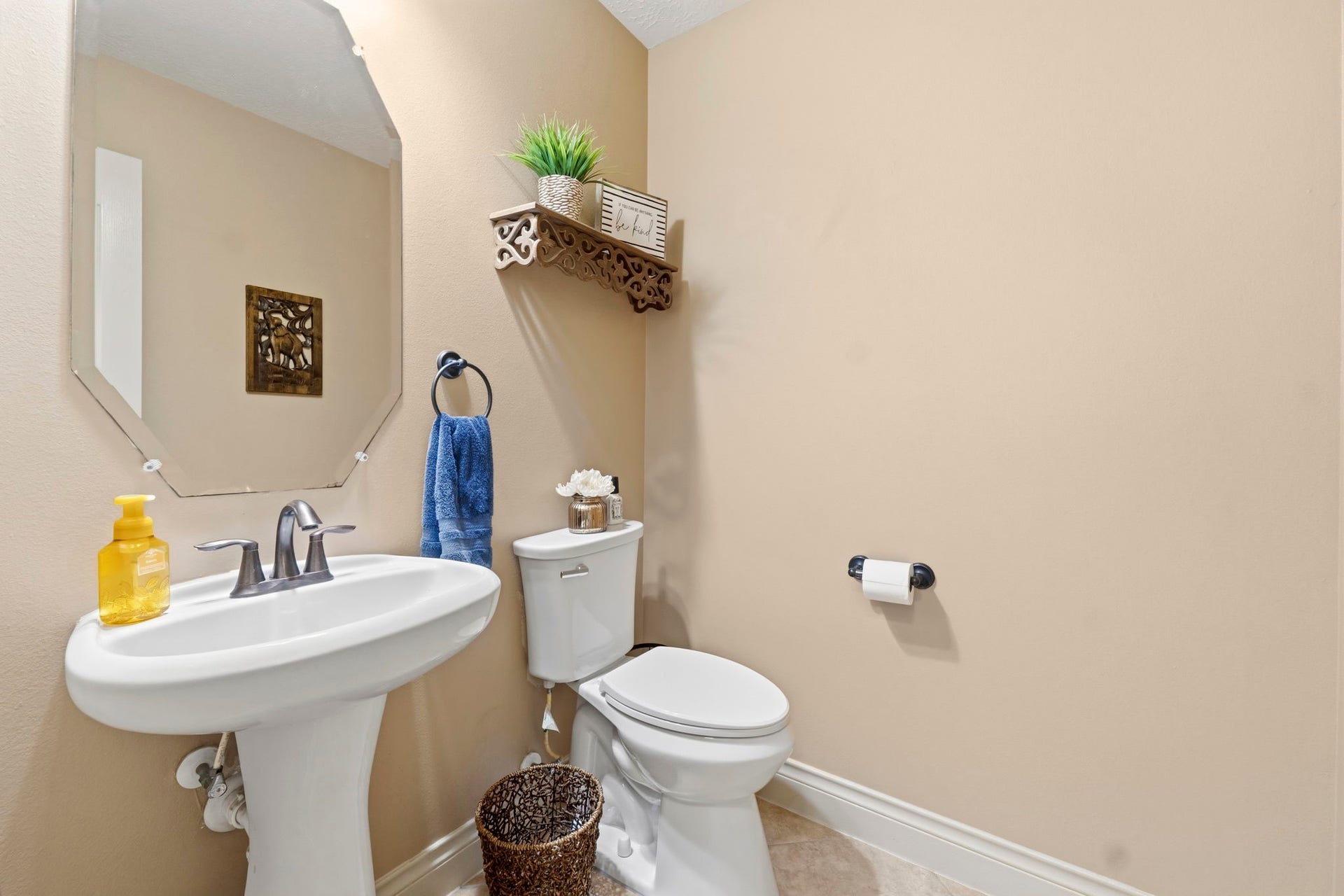 11612 Princess Ann Court, Montgomery, TX 77316 Half-bath for guests is downstairs.